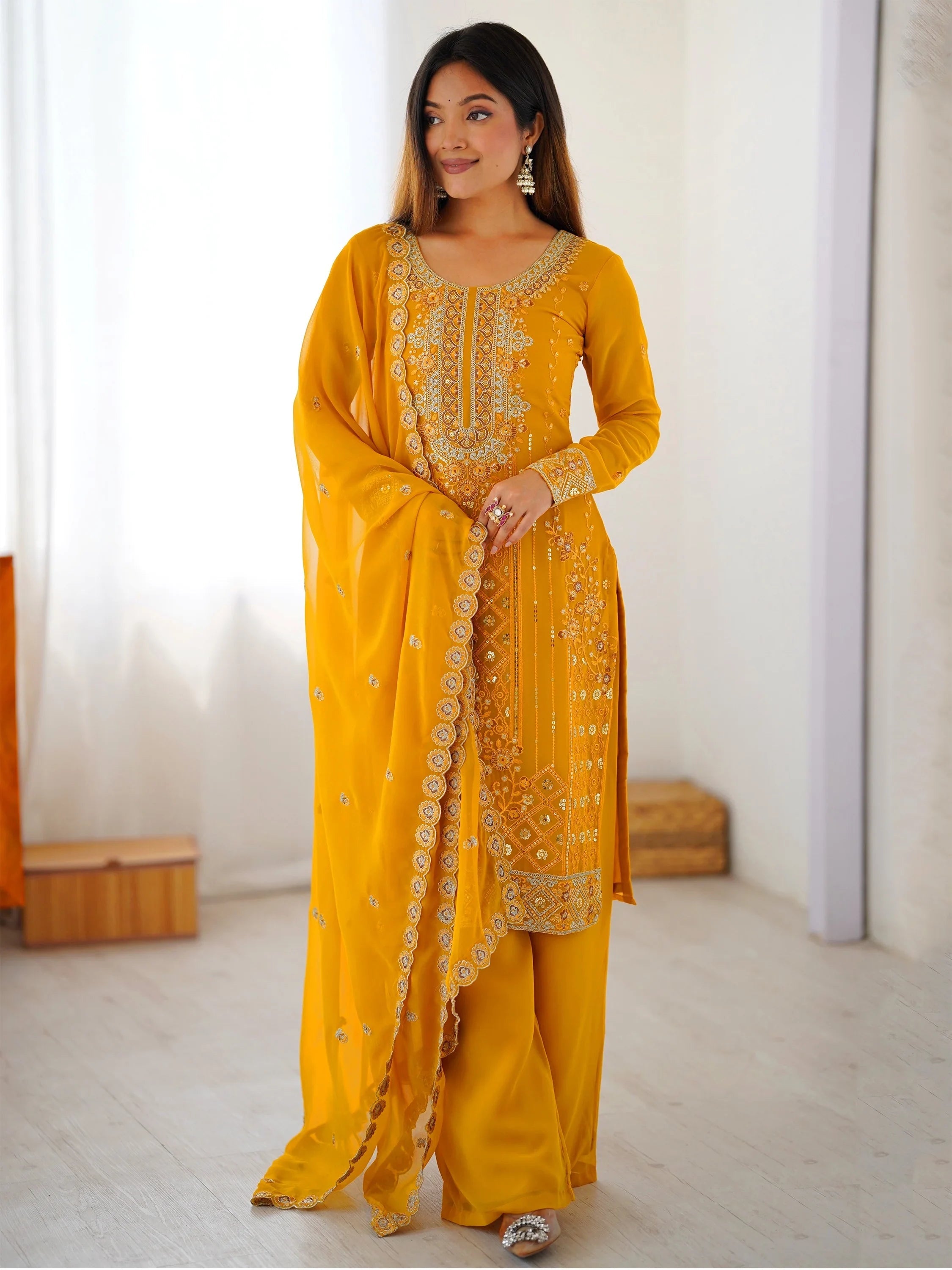 Yellow Outstanding Embroidered Georgette Haldi Wear Palazzo Suit