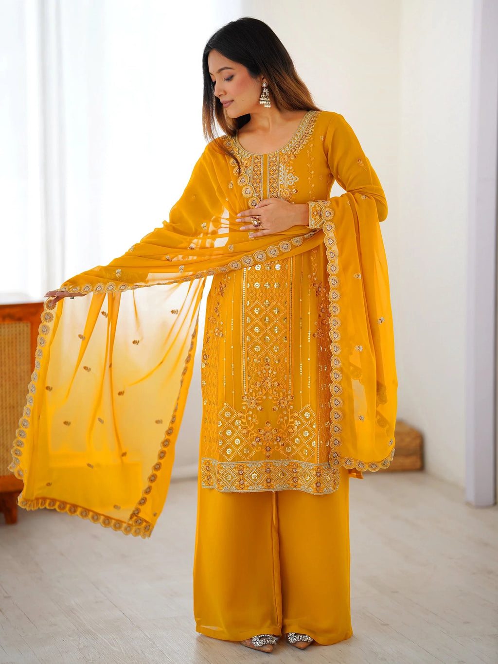 Yellow Outstanding Embroidered Georgette Haldi Wear Palazzo Suit