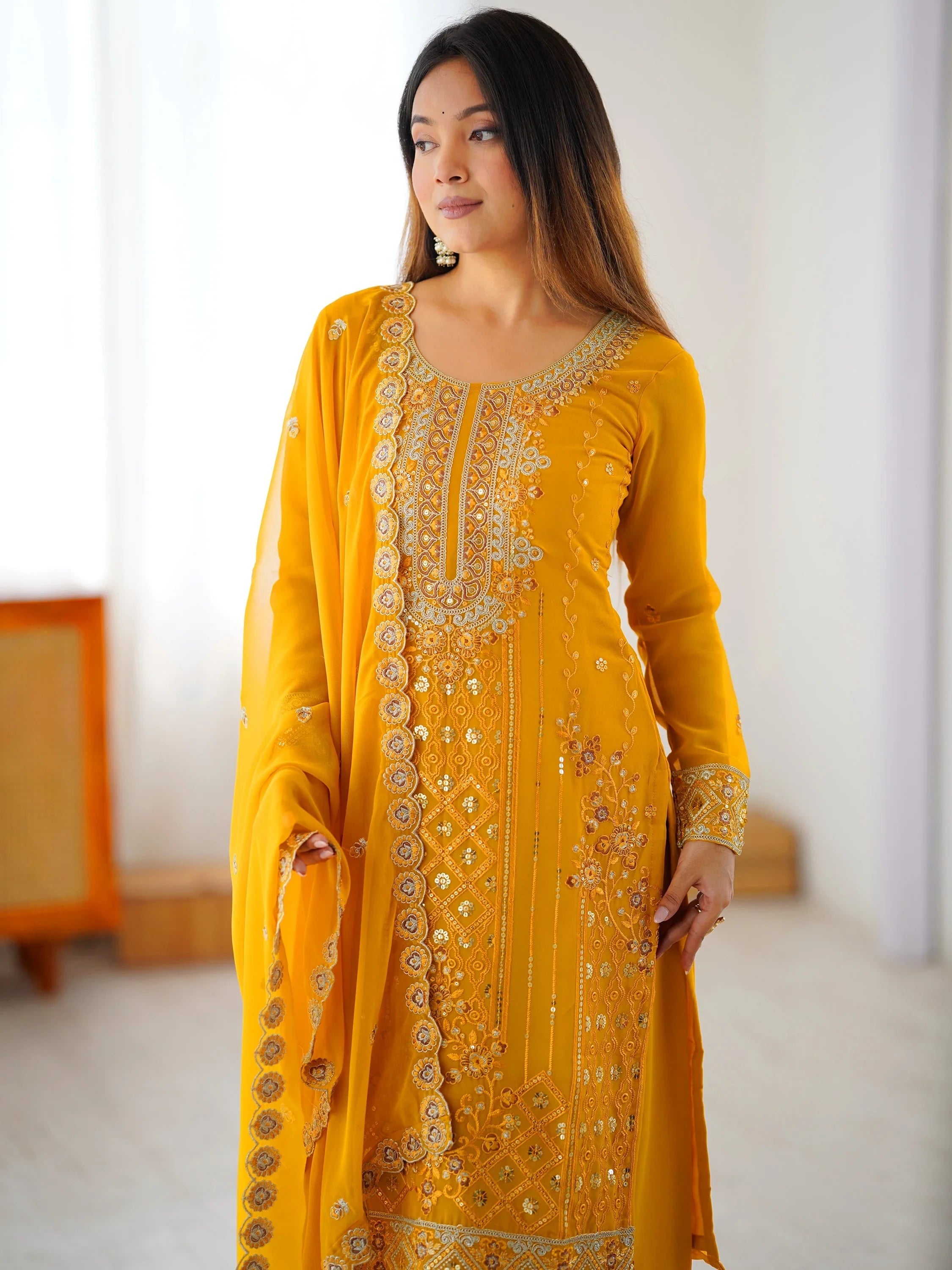 Yellow Outstanding Embroidered Georgette Haldi Wear Palazzo Suit