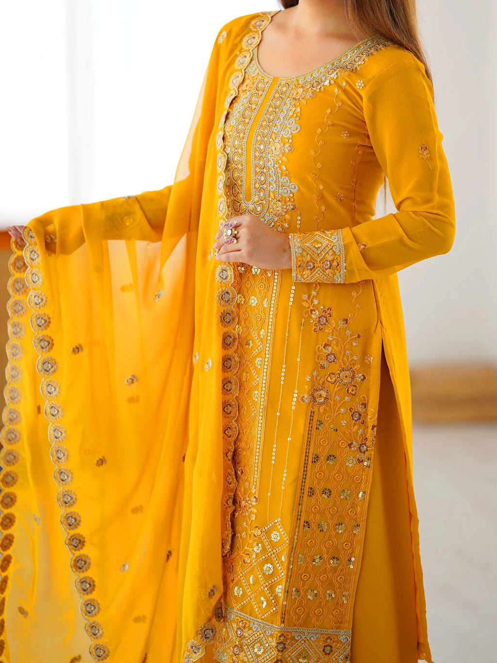 Yellow Outstanding Embroidered Georgette Haldi Wear Palazzo Suit