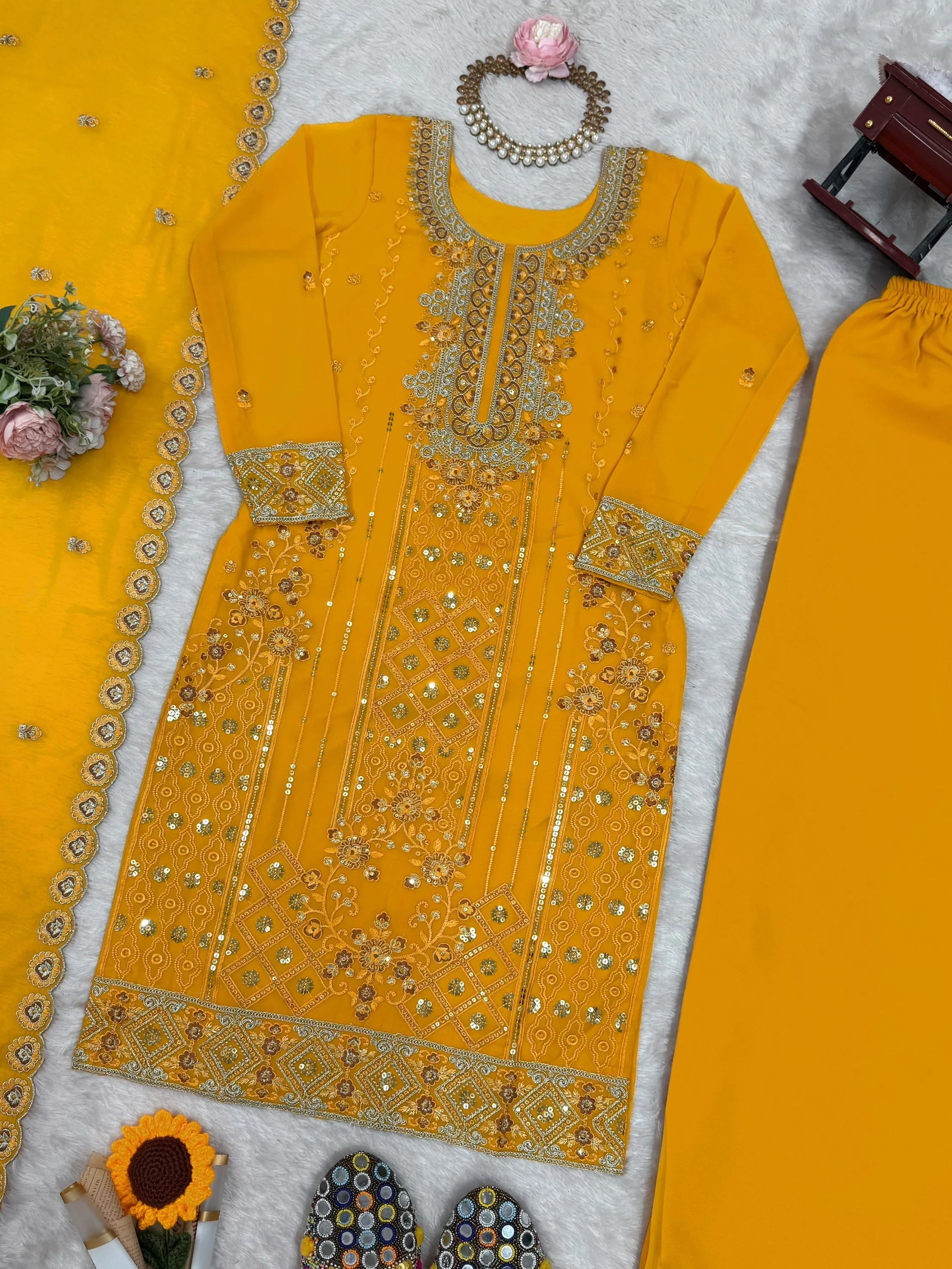 Yellow Outstanding Embroidered Georgette Haldi Wear Palazzo Suit