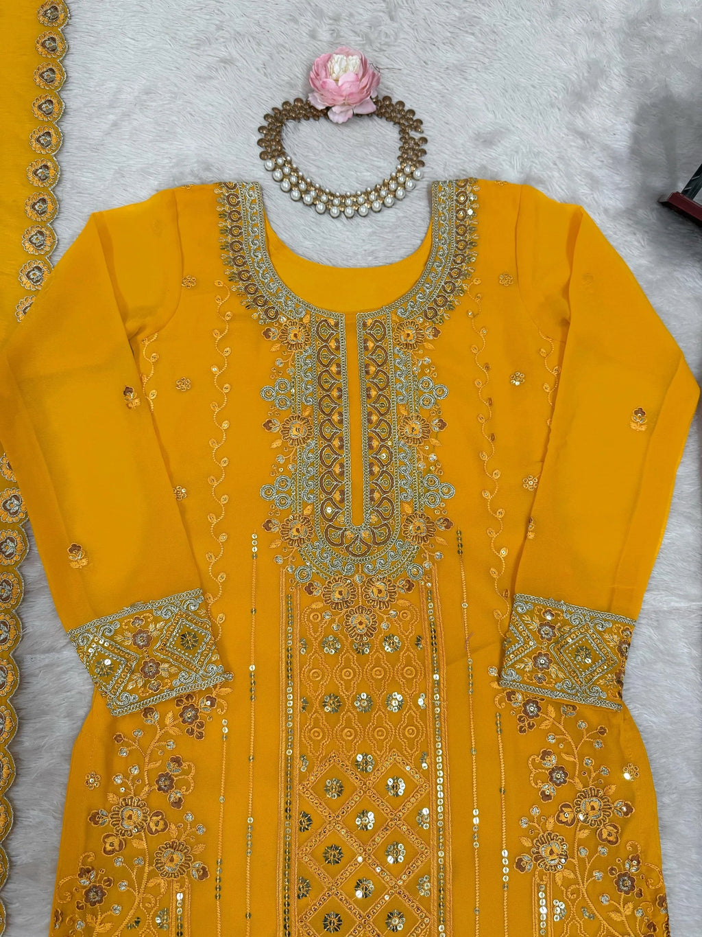 Yellow Outstanding Embroidered Georgette Haldi Wear Palazzo Suit