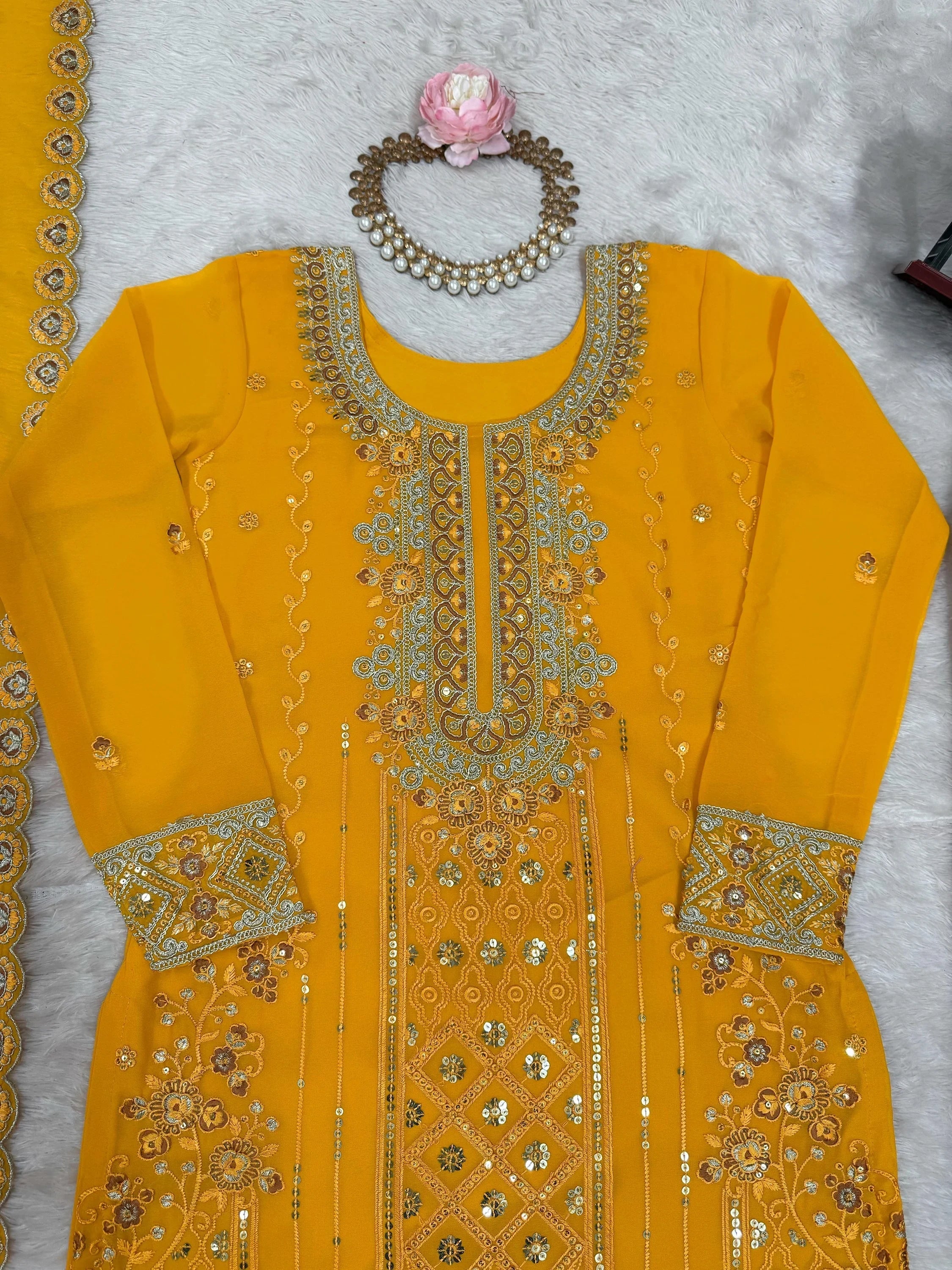 Yellow Outstanding Embroidered Georgette Haldi Wear Palazzo Suit