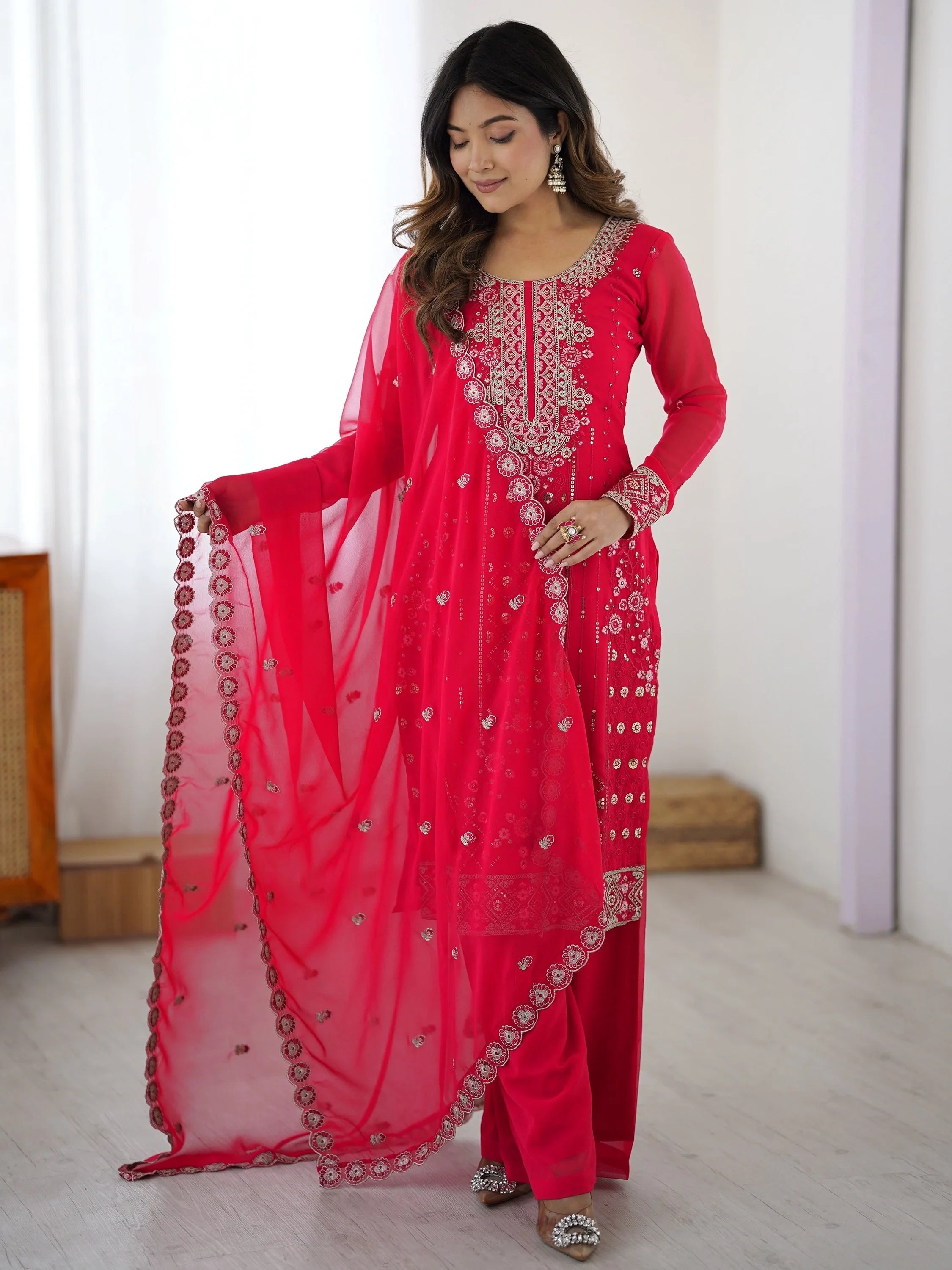 Pink Outstanding Embroidered Georgette Haldi Wear Palazzo Suit