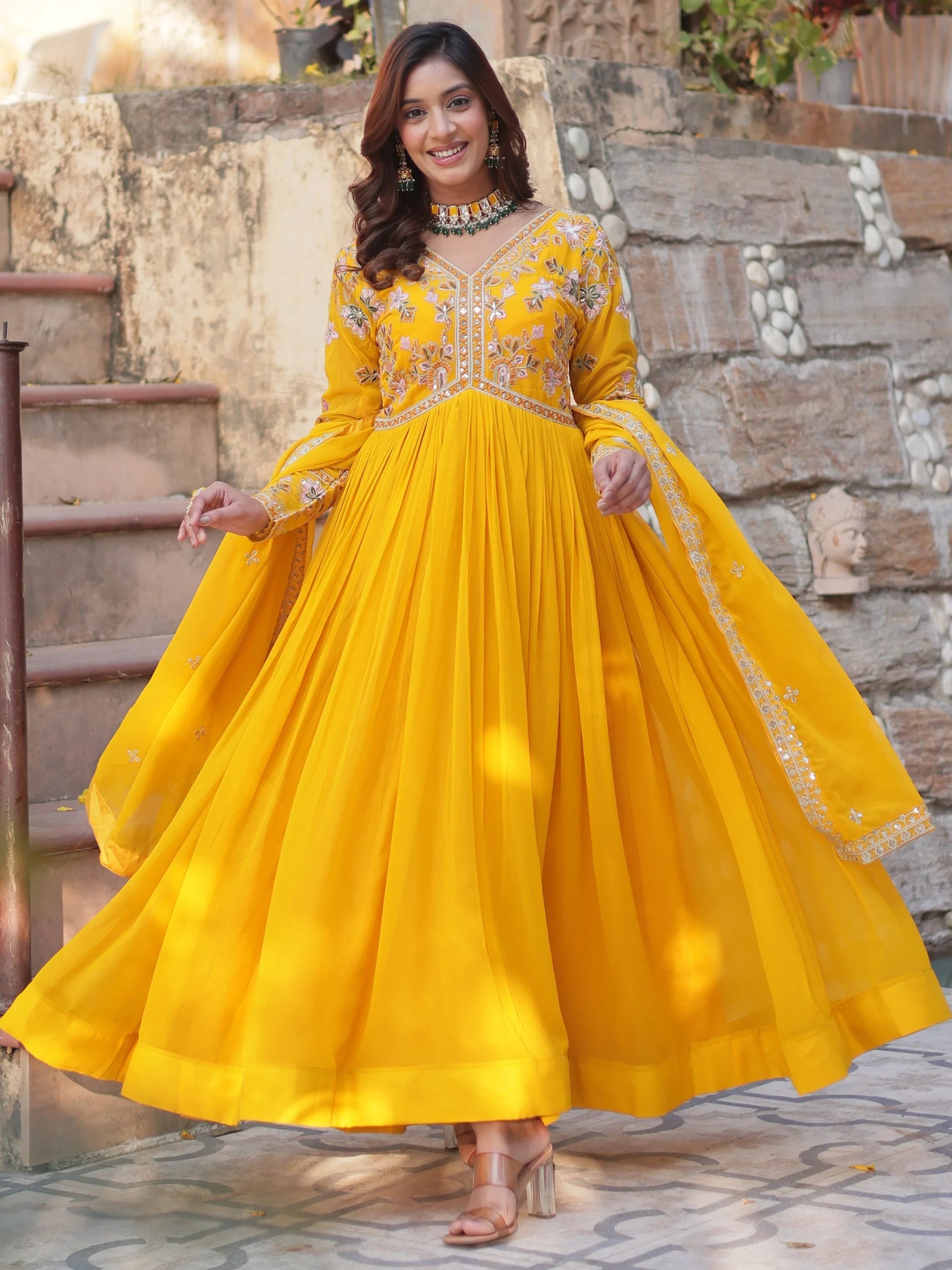 Yellow Noteworthy Floral Work Georgette Engagement Wear Gown With Dupatta