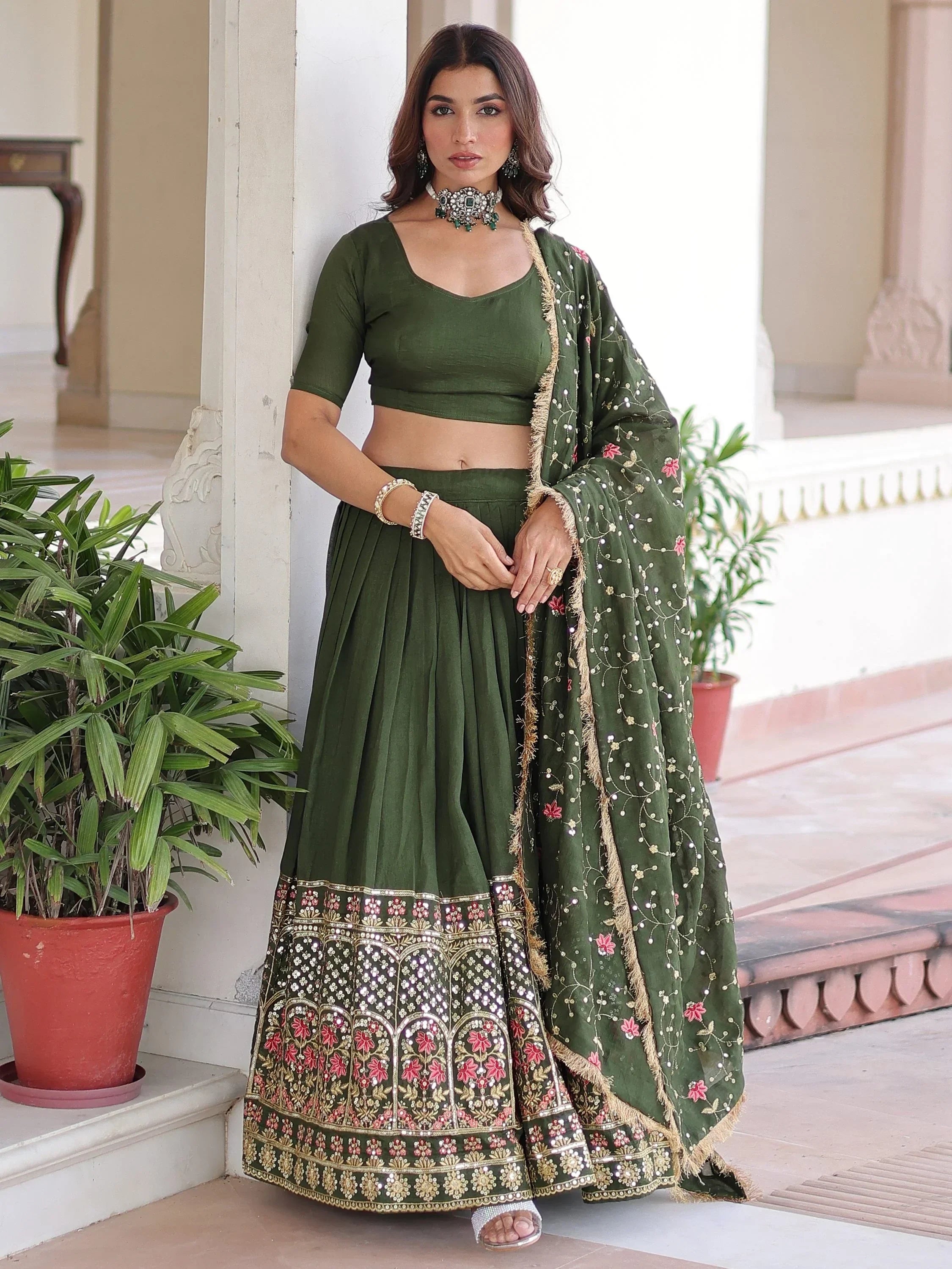 Green Stunning Heavy Sequins Embroidered Silk Festive Wear Lehenga Choli