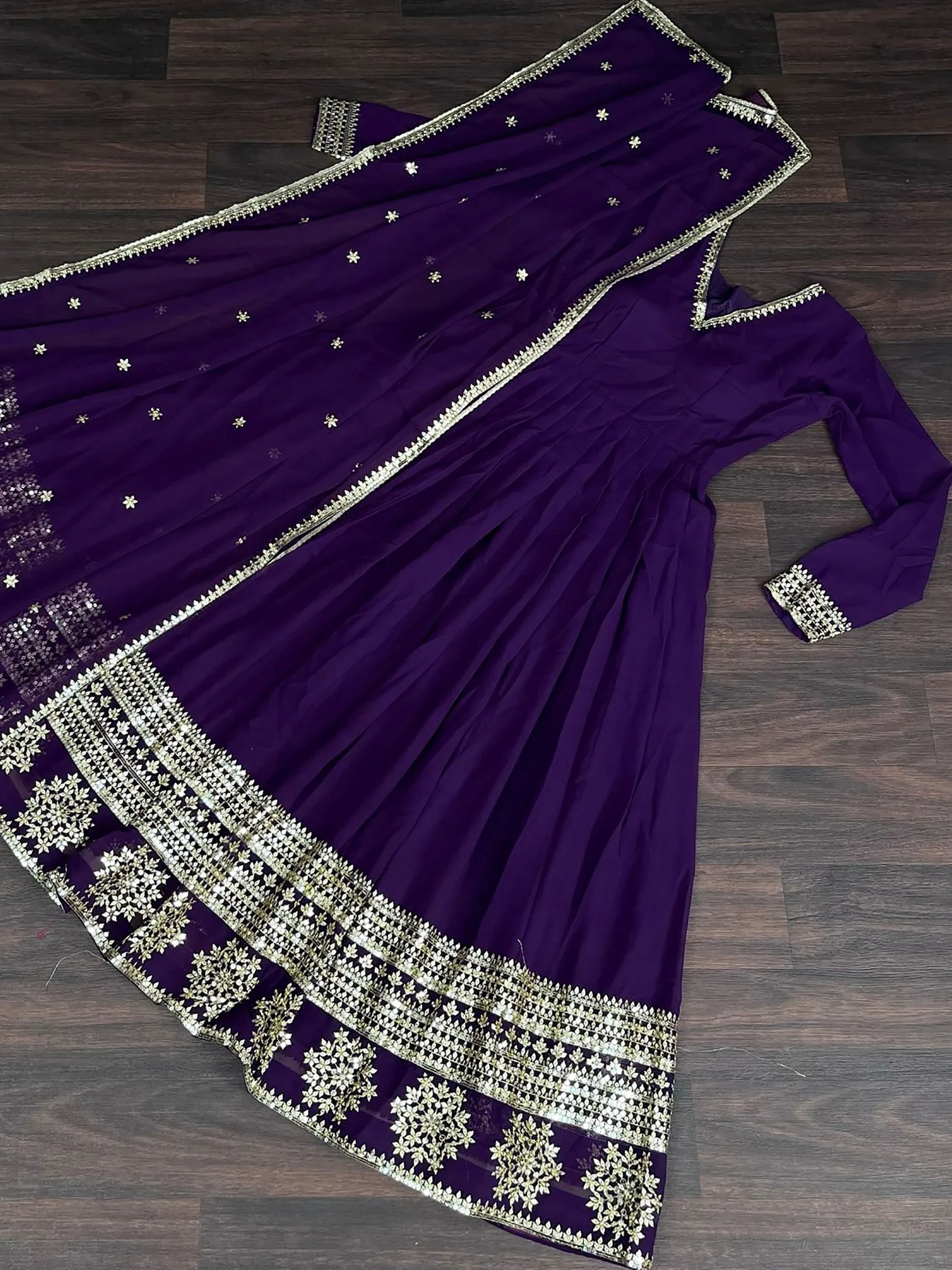 Fabulous Purple Sequins Georgette Reception Wear Gown With Dupatta