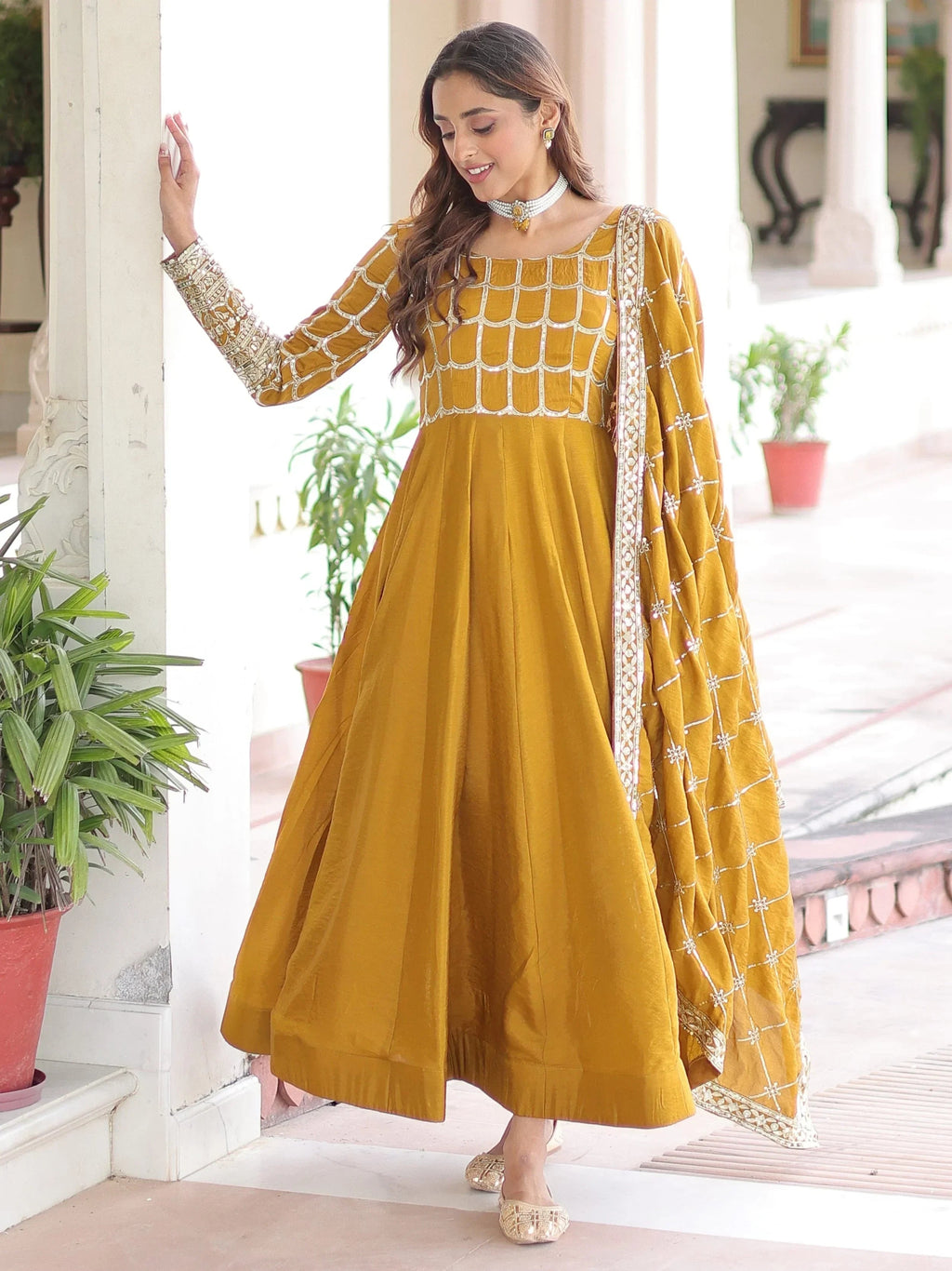 Mustard Dazzling Zari Embroidered Silk Festival Wear Gown With Dupatta