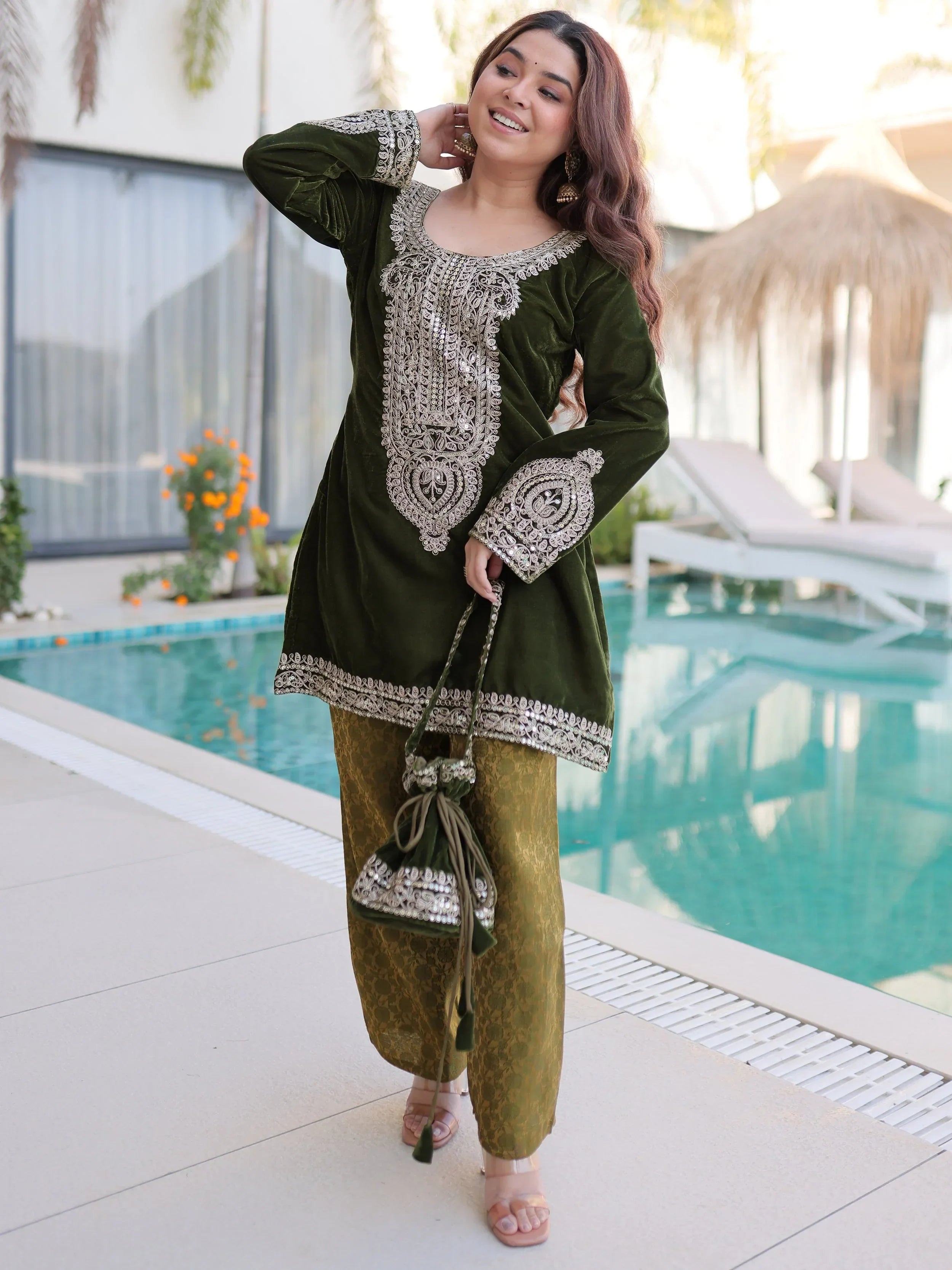 Green Attractive Embroidered Velvet Festival Wear Salwar Kameez