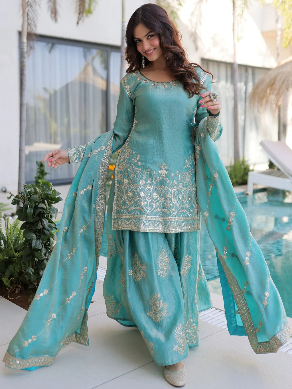 Sky Blue Fantastic Zari Embroidered Crushed Festive Wear Sharara Suit