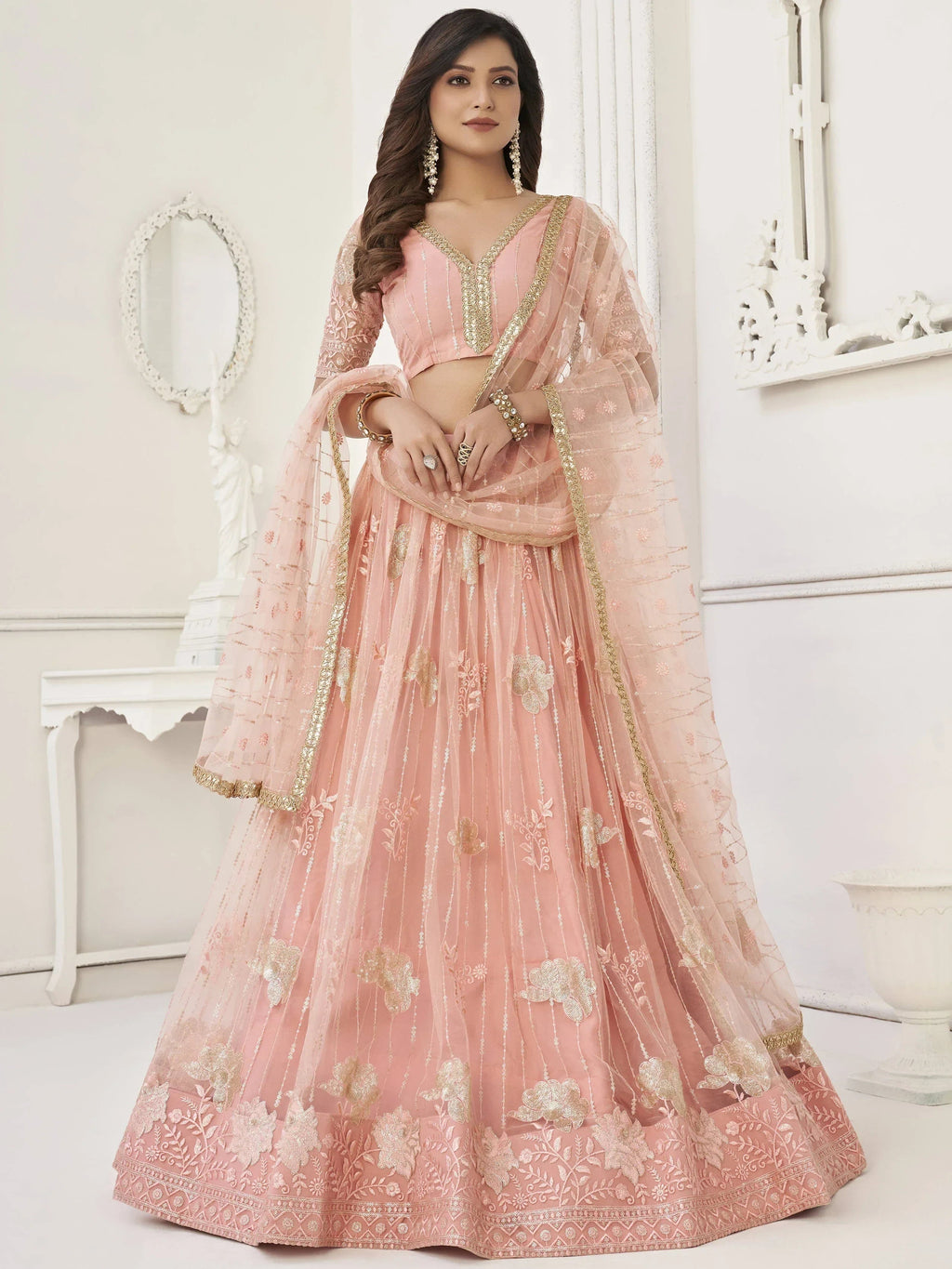 Fascinating Peach Sequin Net Bridesmaid Lehenga Choli With Dupatta