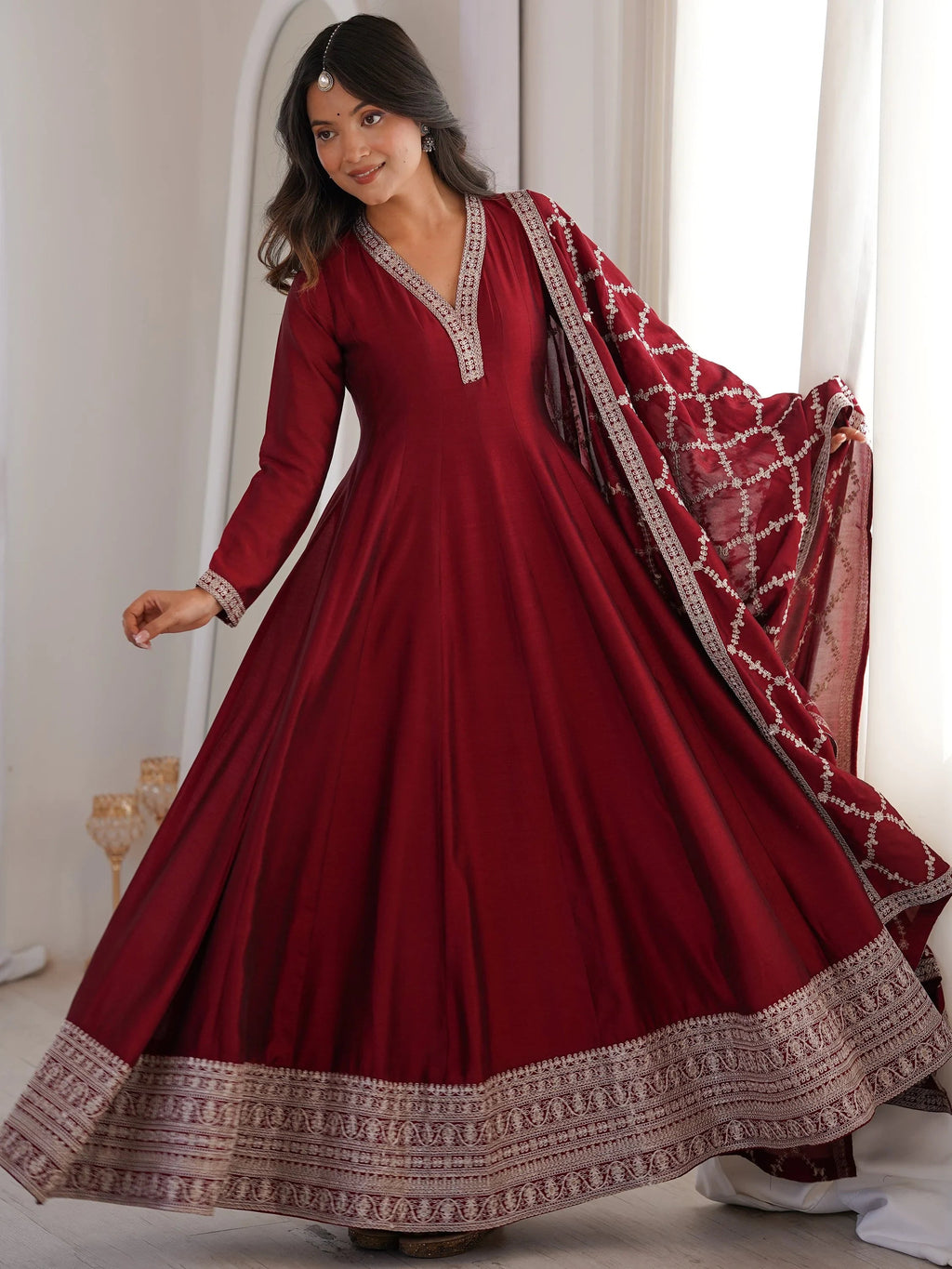 Glamorous Maroon Embroidered Silk Festival Wear Gown With Dupatta