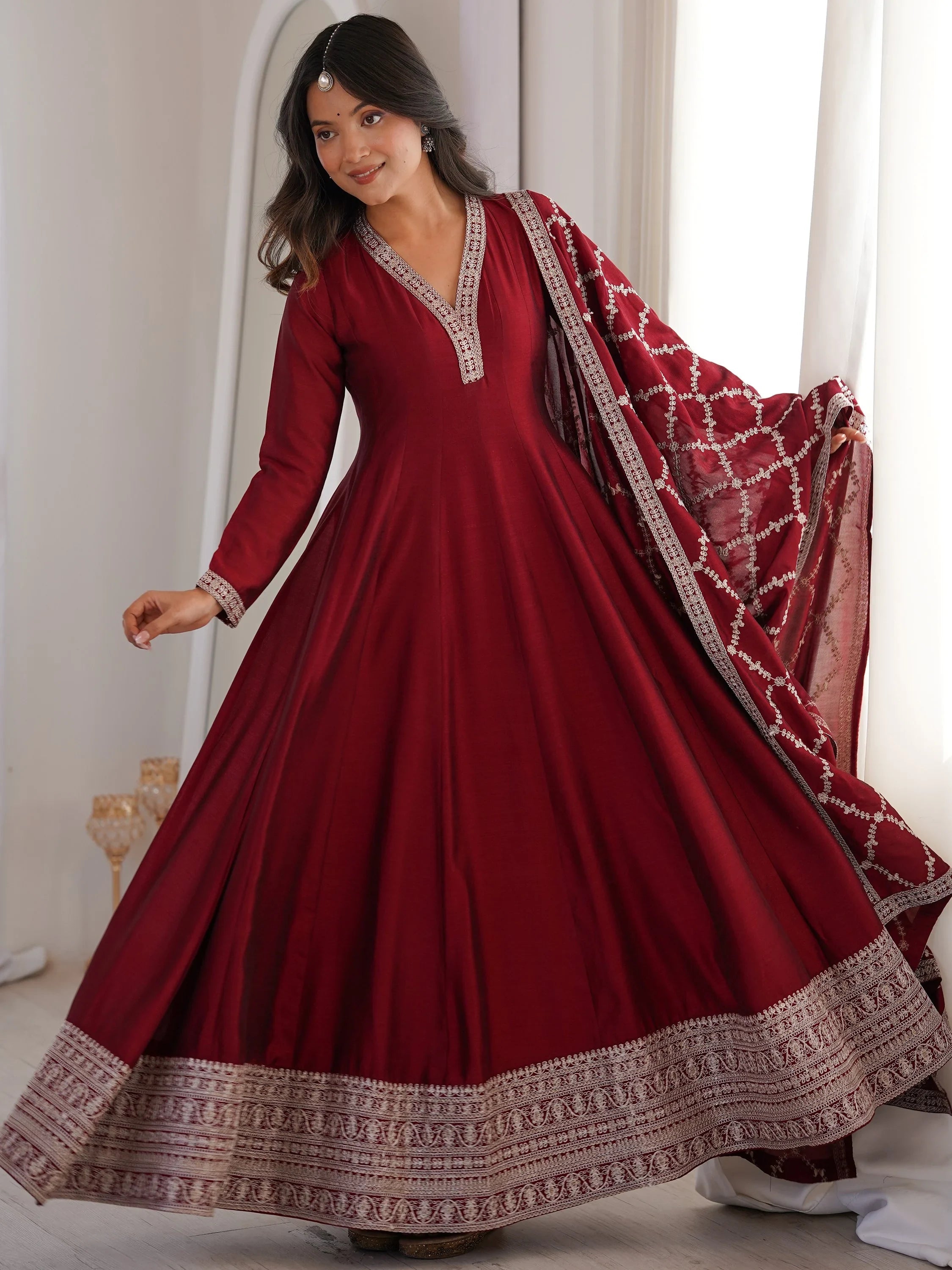 Glamorous Maroon Embroidered Silk Festival Wear Gown With Dupatta