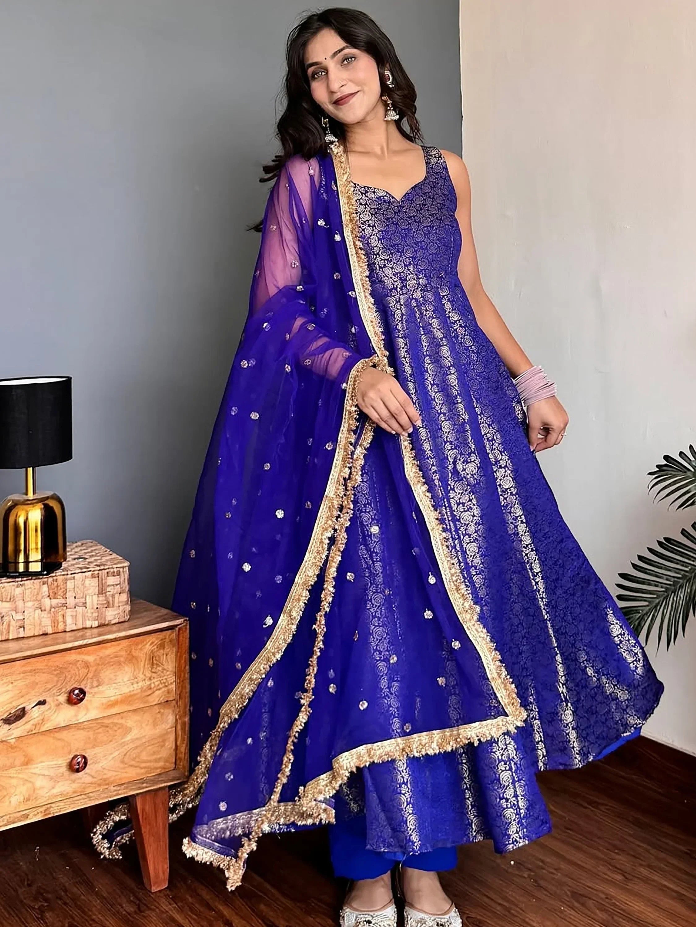 Blue Glowing Zari Weaving Jacquard Function Wear Gown With Dupatta
