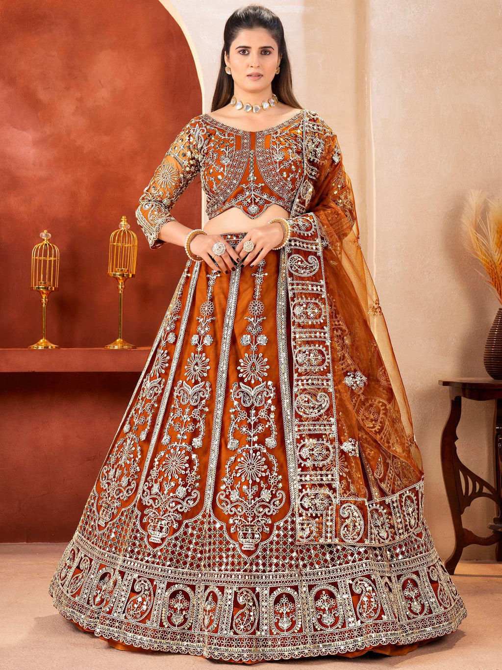 Orange Fabulous Embroidered Net Reception Wear Lehenga Choli