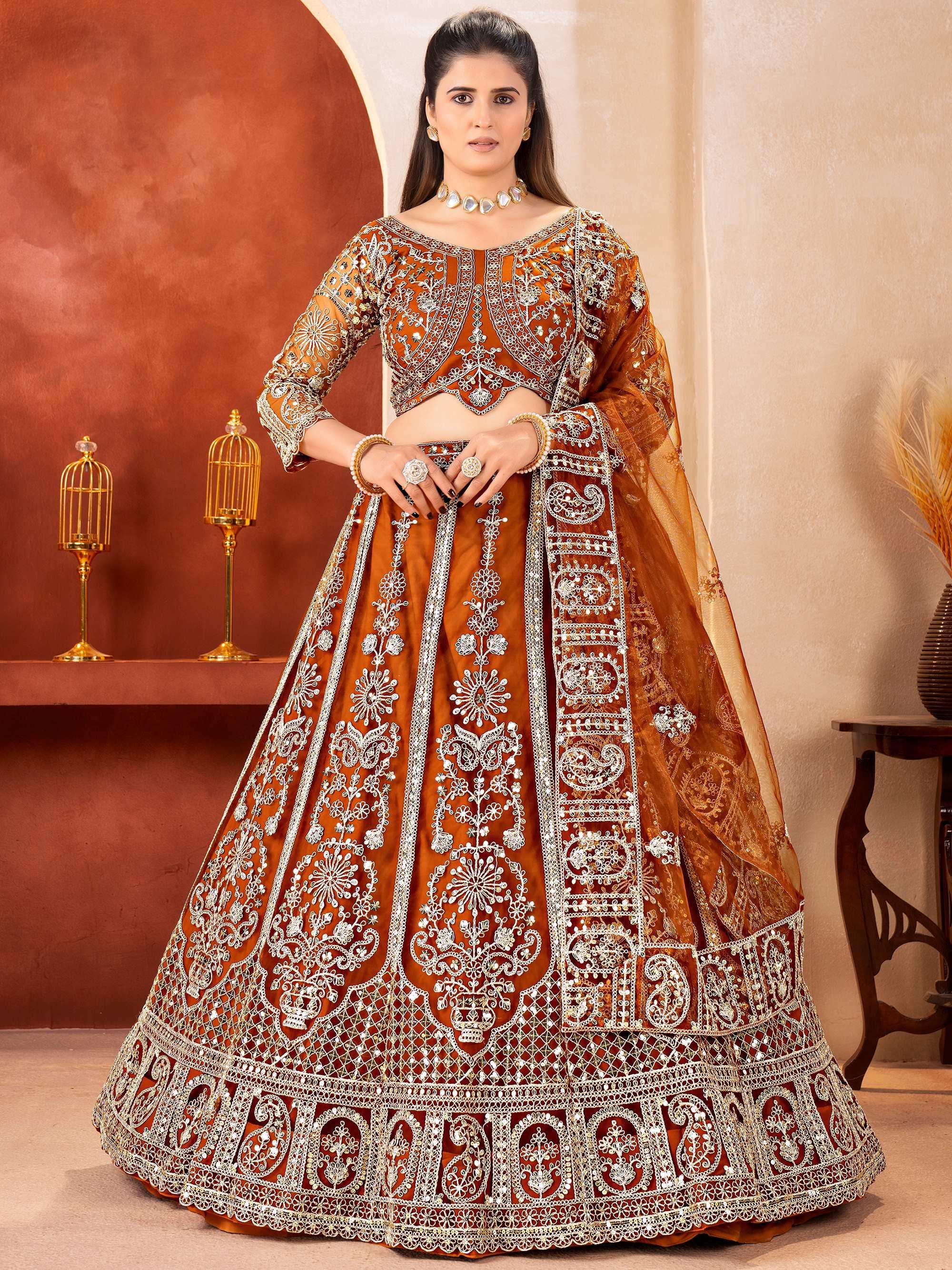 Orange Fabulous Embroidered Net Reception Wear Lehenga Choli