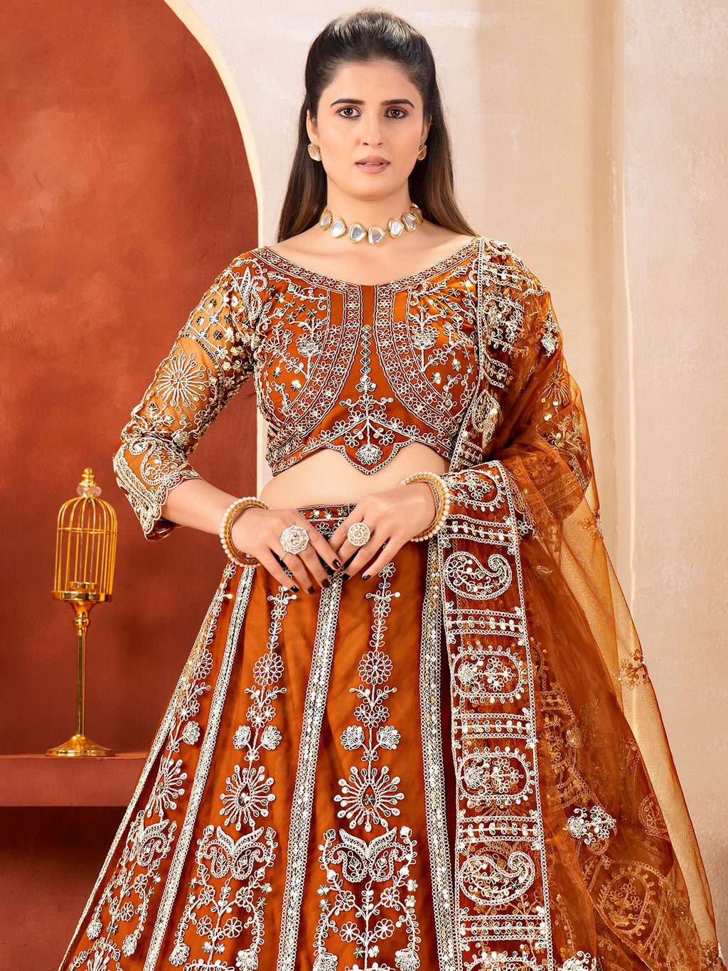 Orange Fabulous Embroidered Net Reception Wear Lehenga Choli