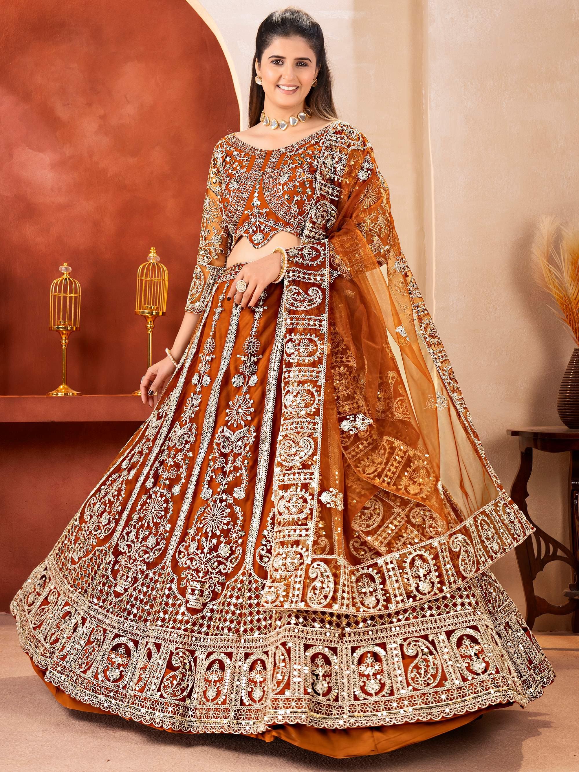 Orange Fabulous Embroidered Net Reception Wear Lehenga Choli