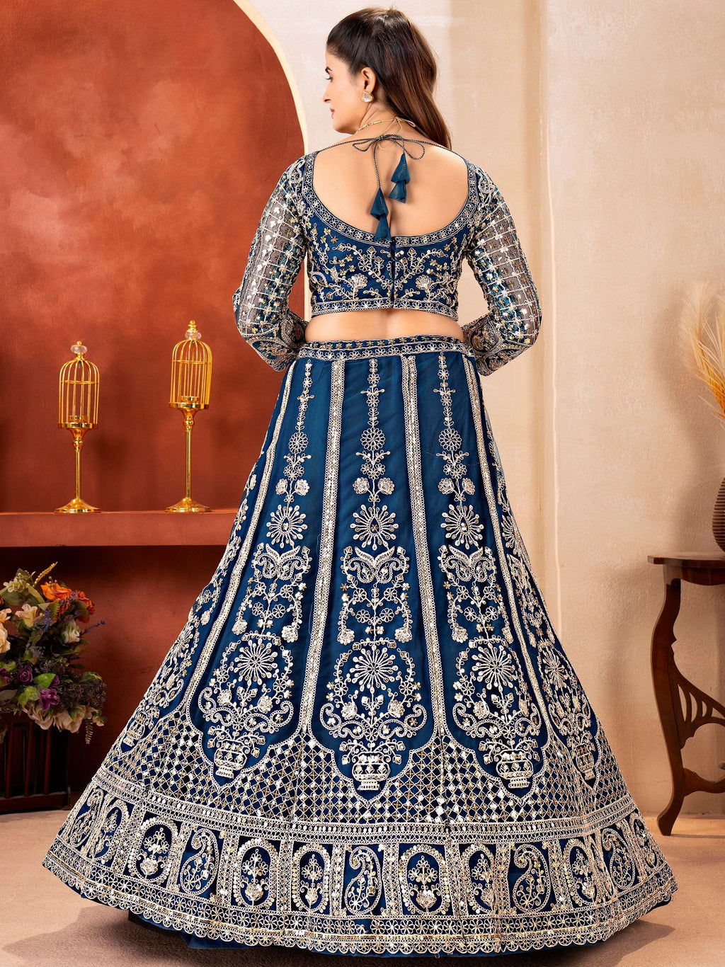 Teal Fabulous Embroidered Net Reception Wear Lehenga Choli
