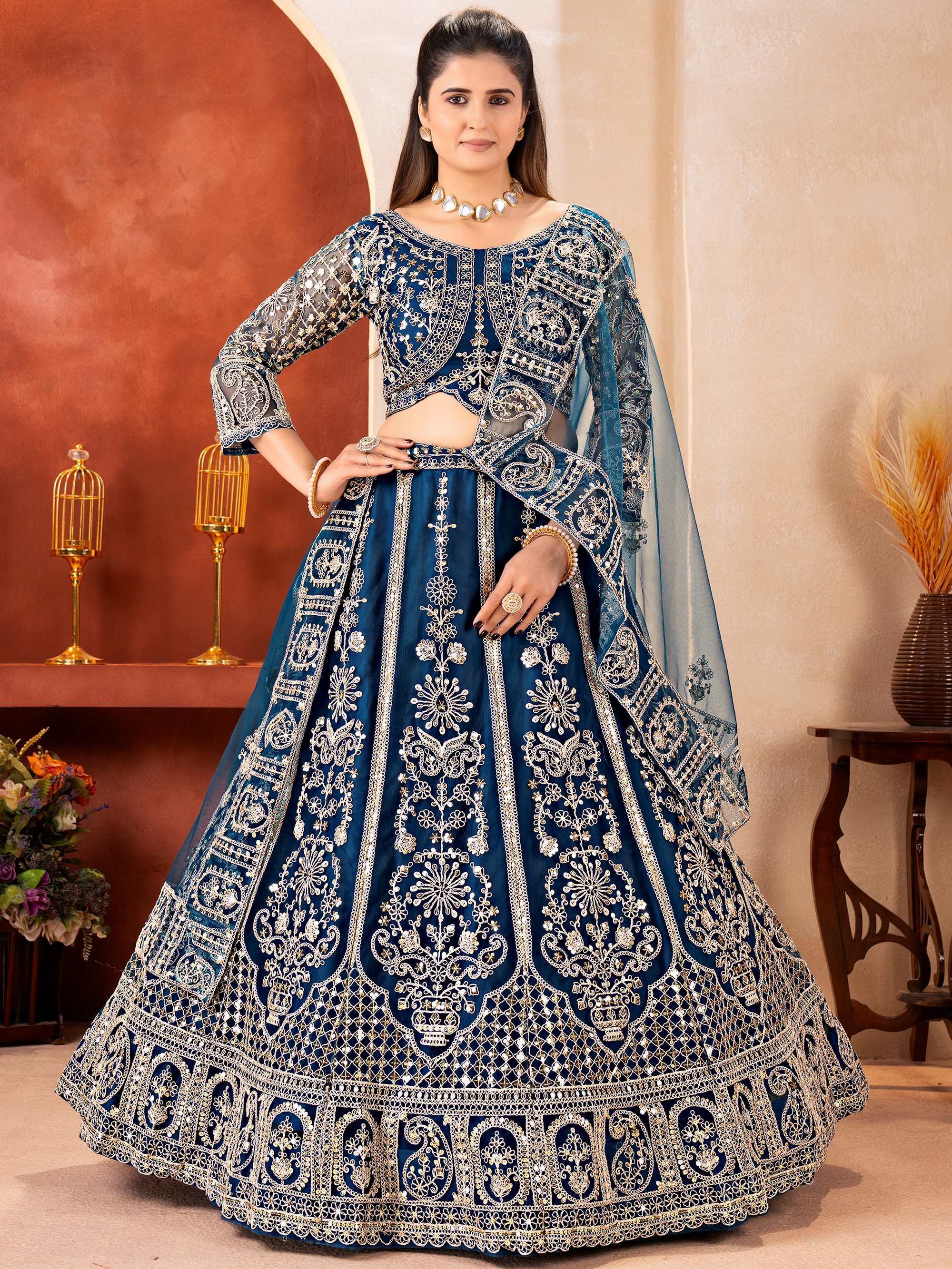 Teal Fabulous Embroidered Net Reception Wear Lehenga Choli