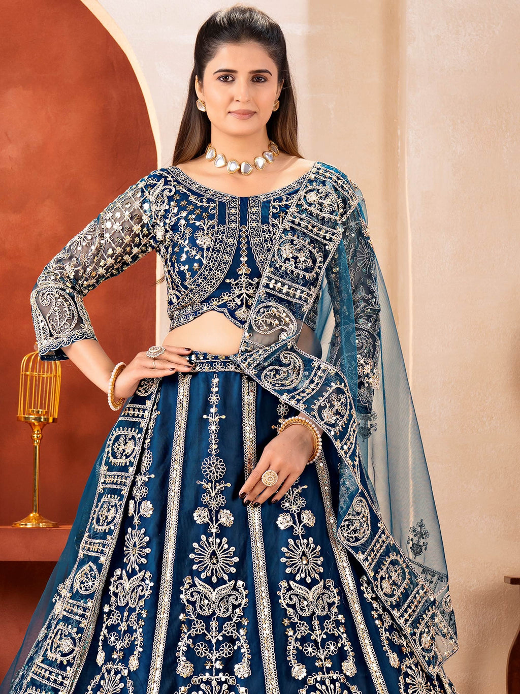 Teal Fabulous Embroidered Net Reception Wear Lehenga Choli