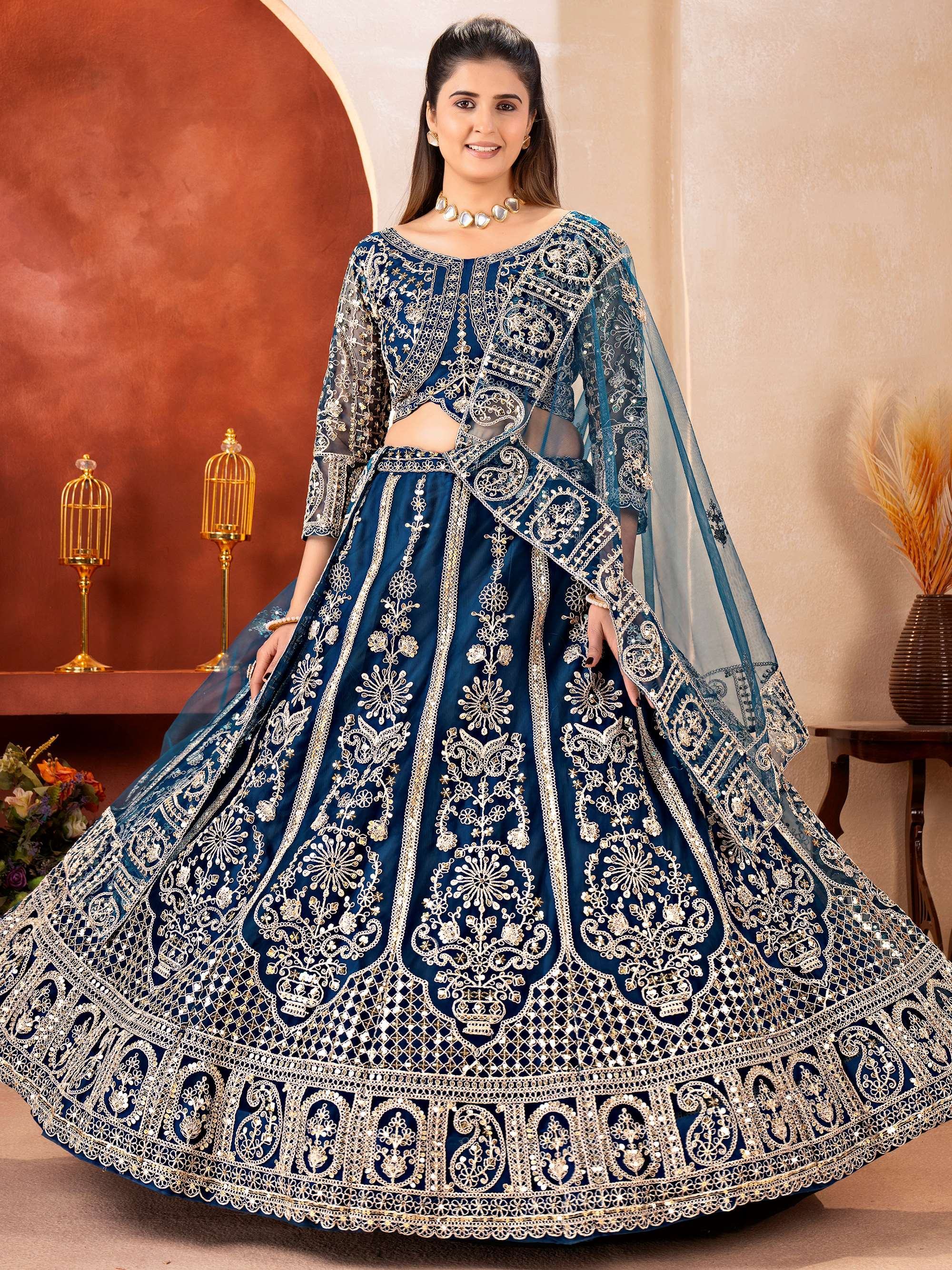 Teal Fabulous Embroidered Net Reception Wear Lehenga Choli