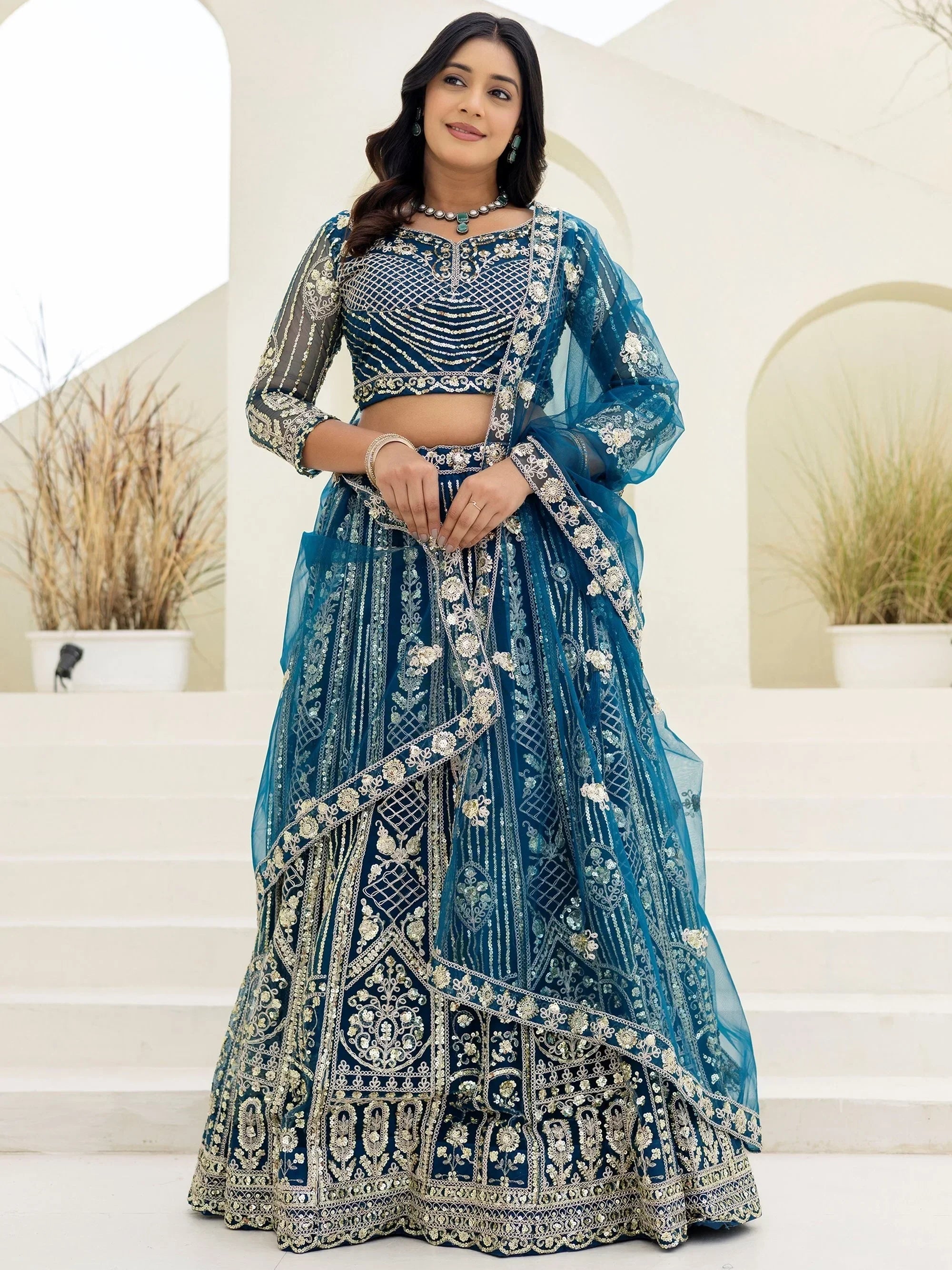 Blue Amazing Sequins Embroidered Net Party Wear Lehenga Choli