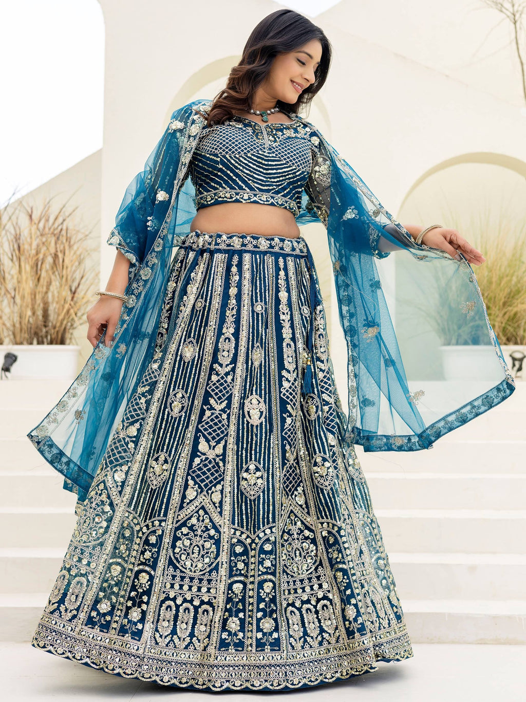 Blue Amazing Sequins Embroidered Net Party Wear Lehenga Choli