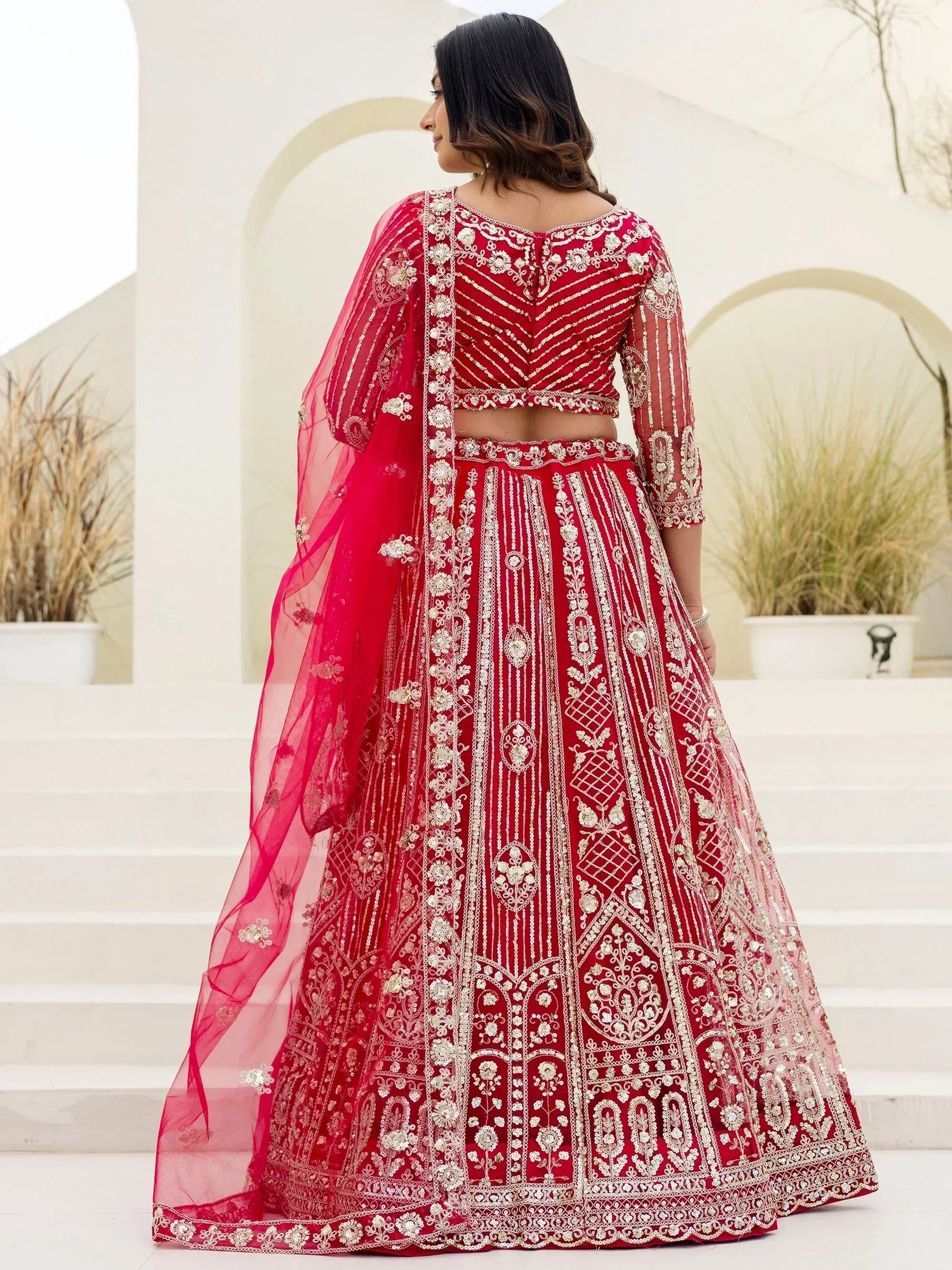 Red Amazing Sequins Embroidered Net Party Wear Lehenga Choli