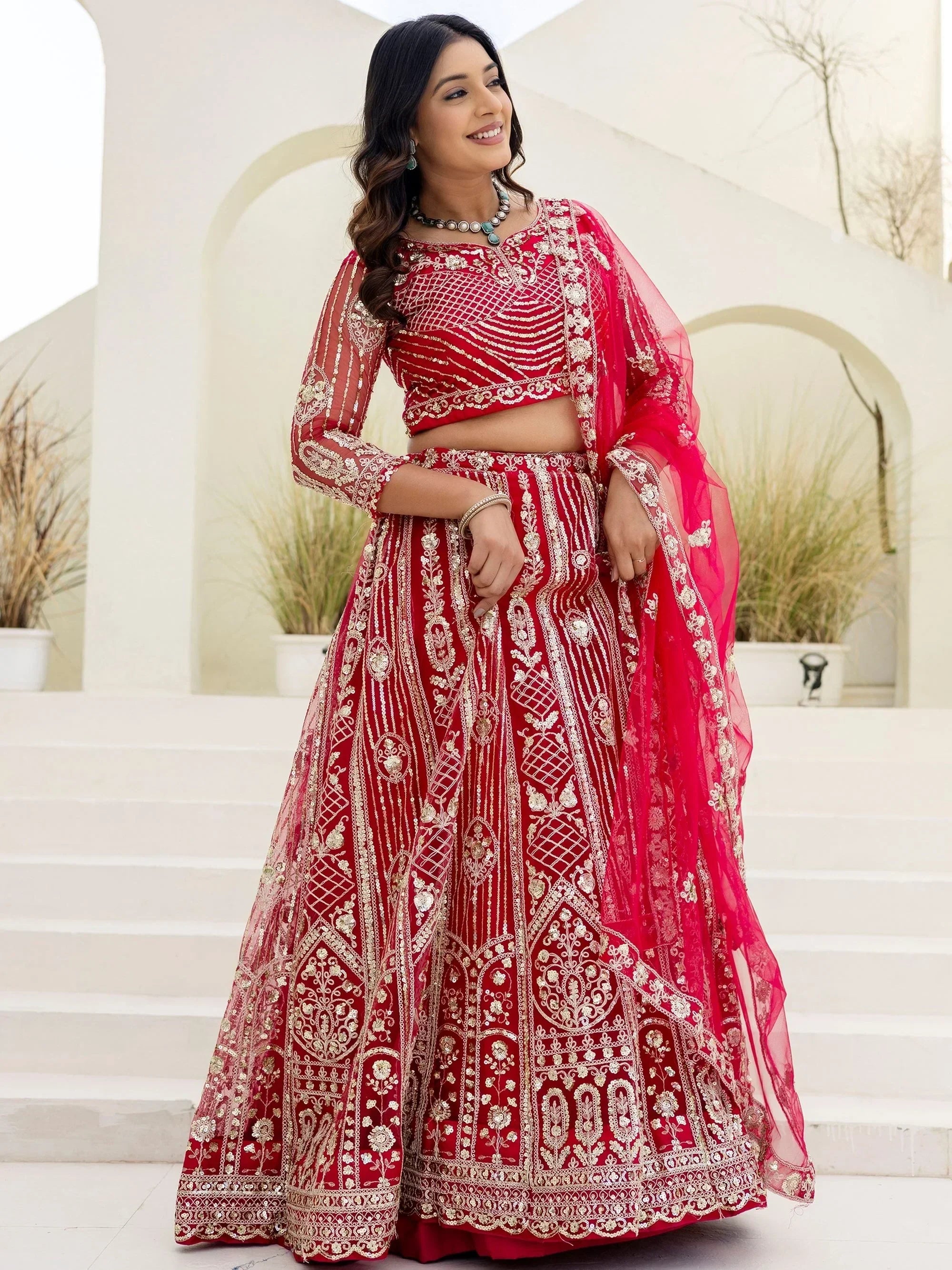 Red Amazing Sequins Embroidered Net Party Wear Lehenga Choli