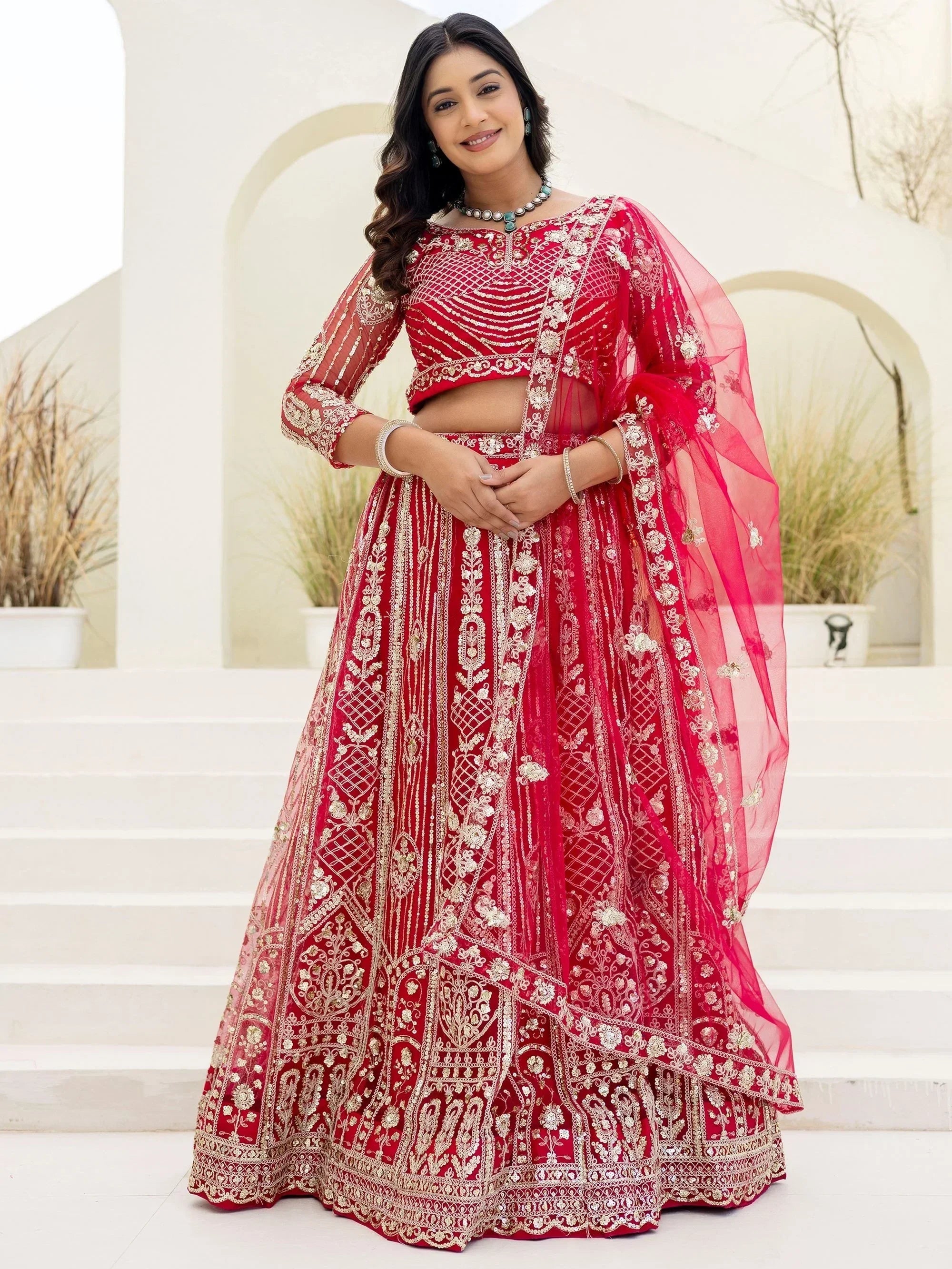 Red Amazing Sequins Embroidered Net Party Wear Lehenga Choli