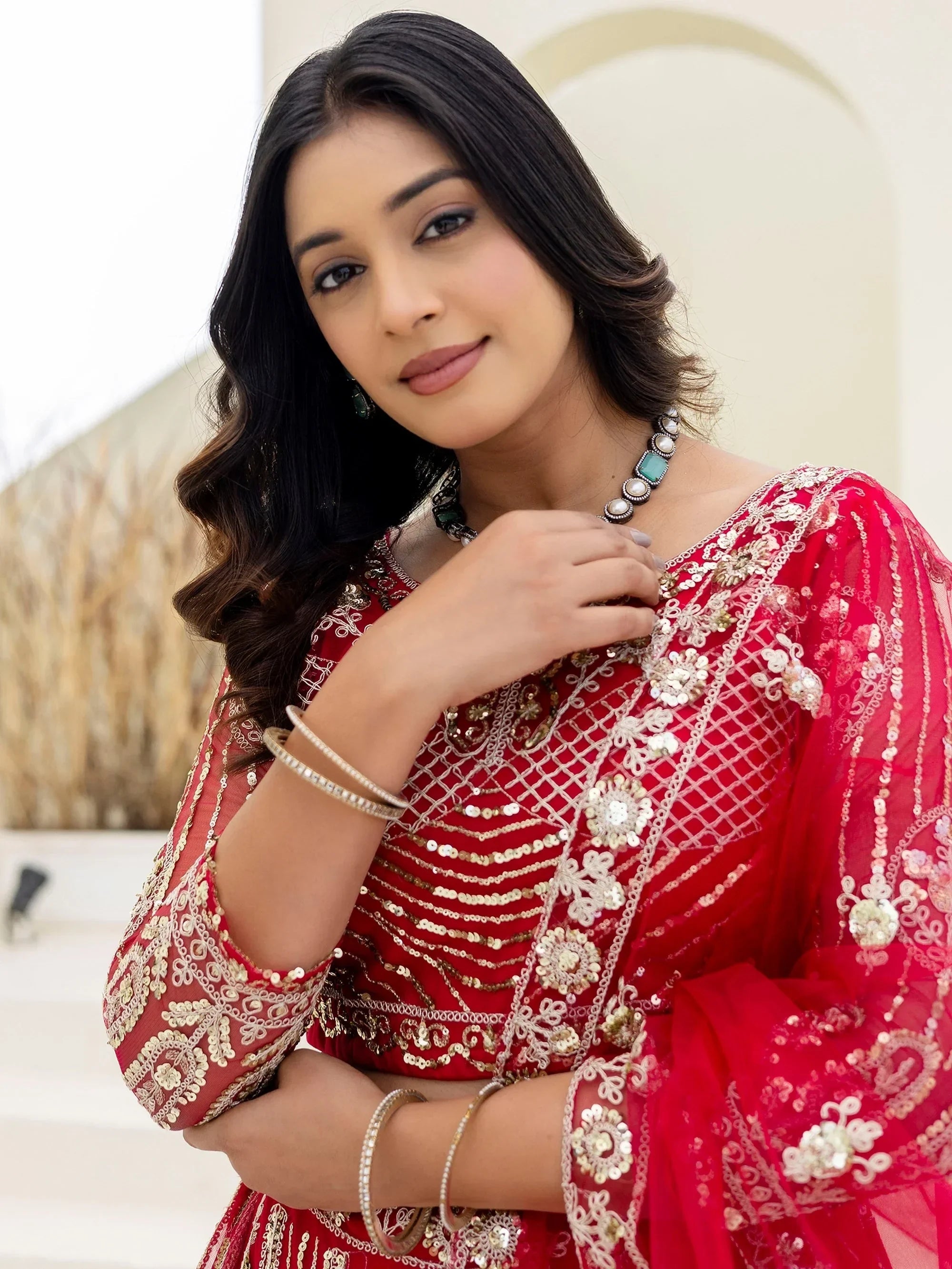 Red Amazing Sequins Embroidered Net Party Wear Lehenga Choli