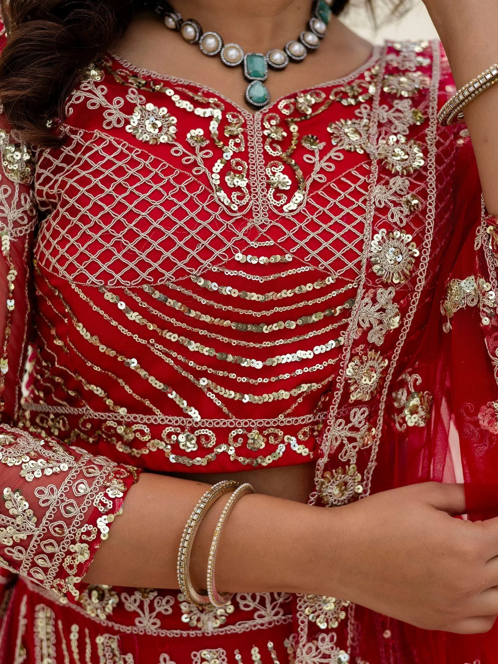 Red Amazing Sequins Embroidered Net Party Wear Lehenga Choli