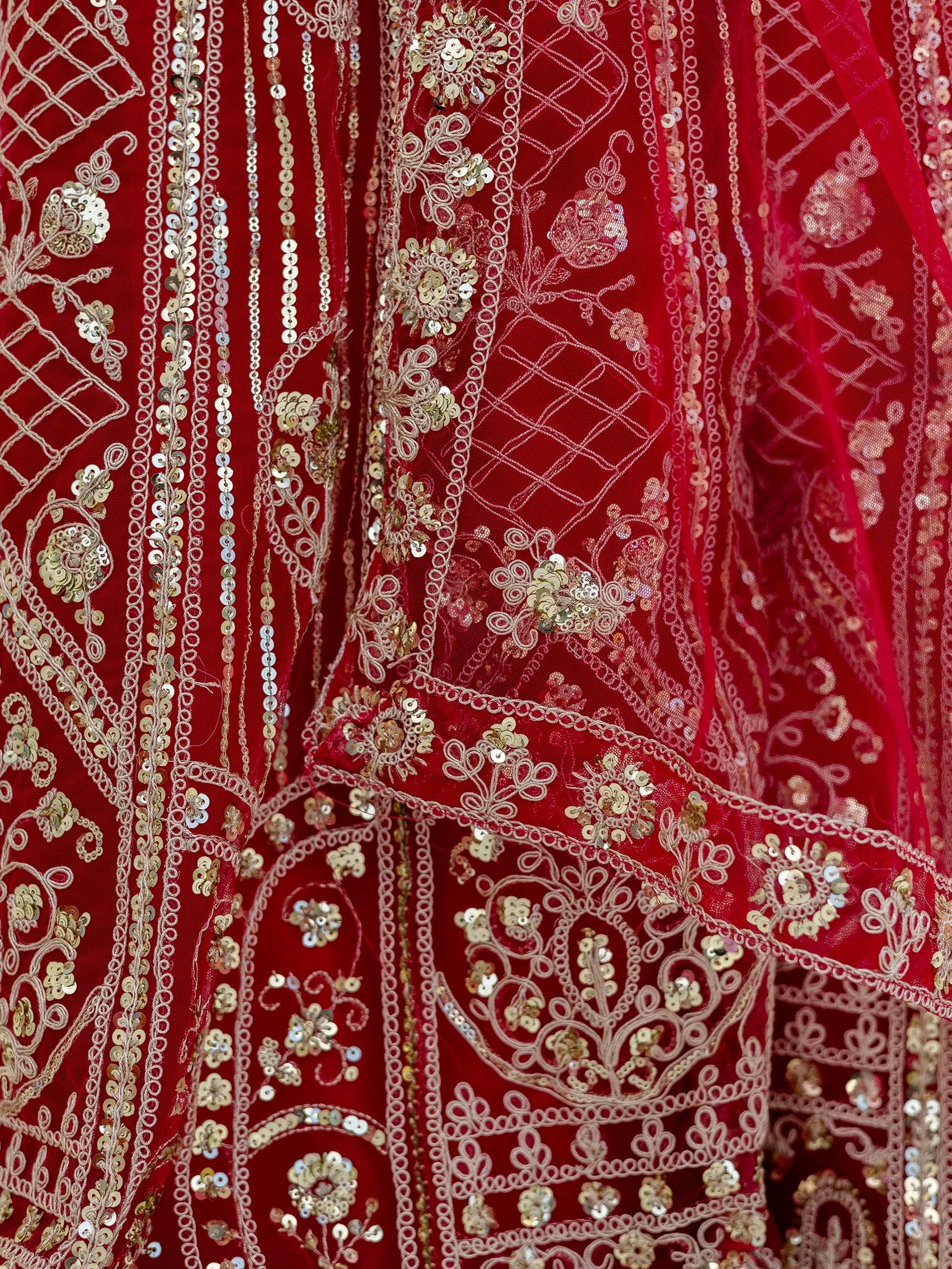 Red Amazing Sequins Embroidered Net Party Wear Lehenga Choli