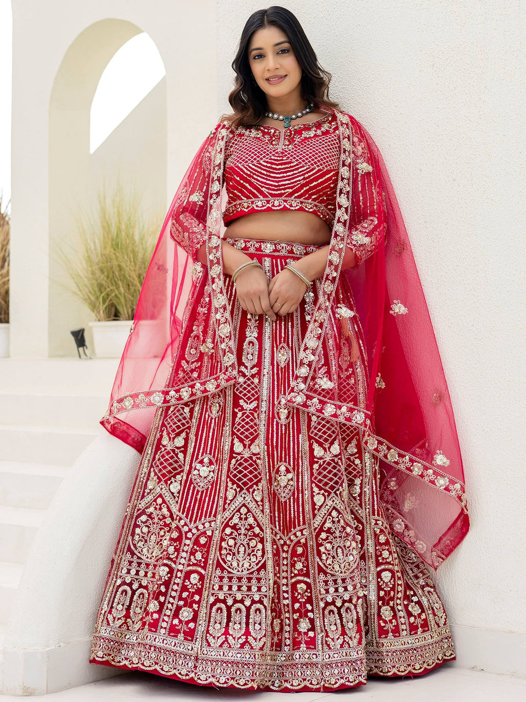 Red Amazing Sequins Embroidered Net Party Wear Lehenga Choli