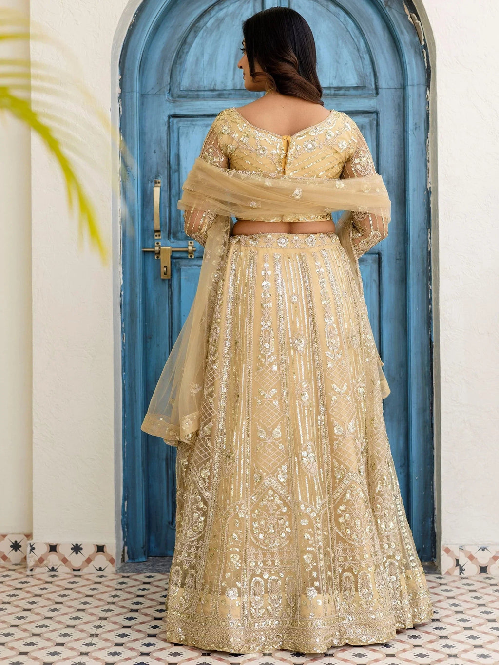 Cream Amazing Sequins Embroidered Net Party Wear Lehenga Choli