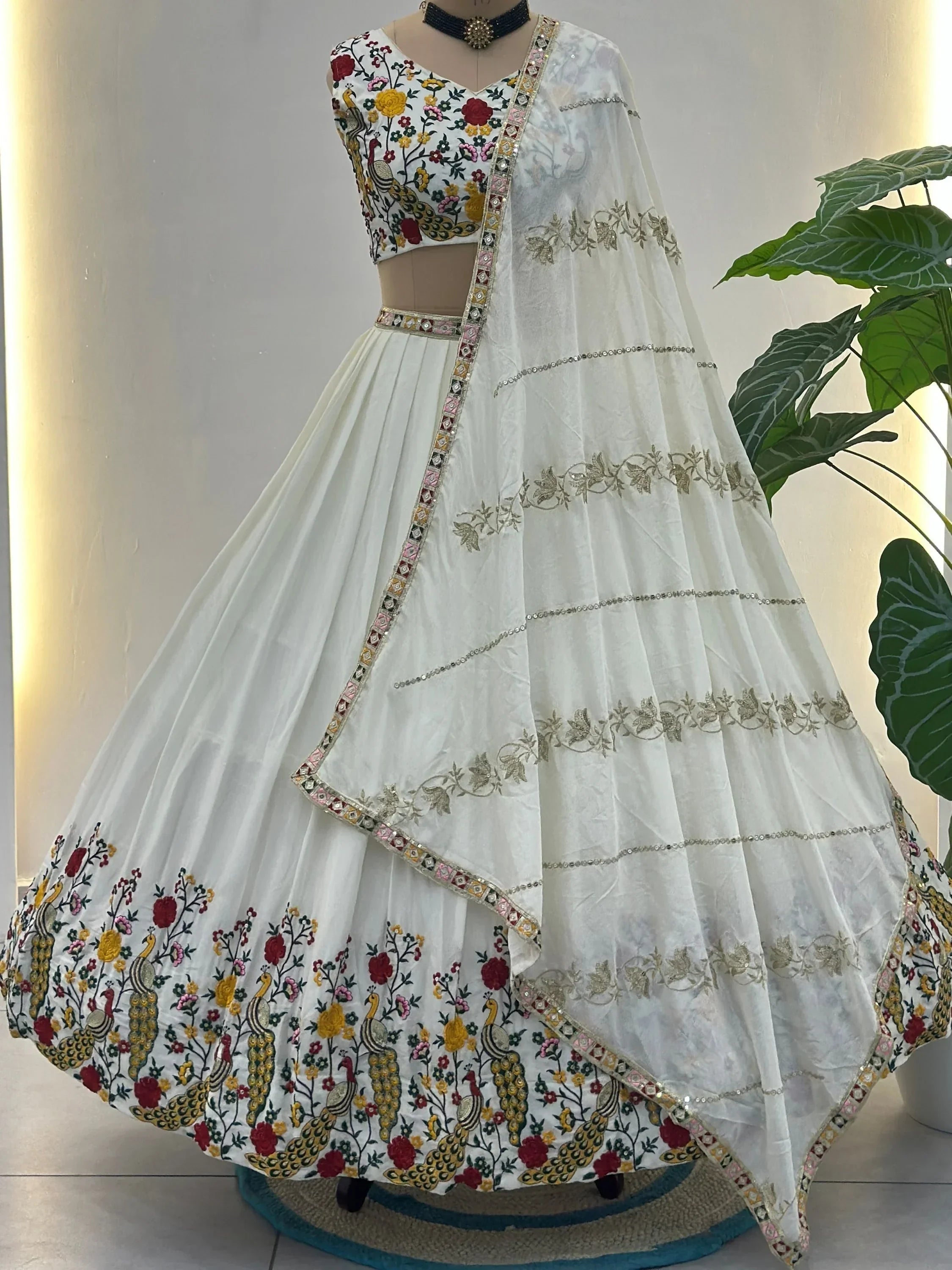 Fantastic Off-White Embroidered Net Wedding Wear Lehenga Choli