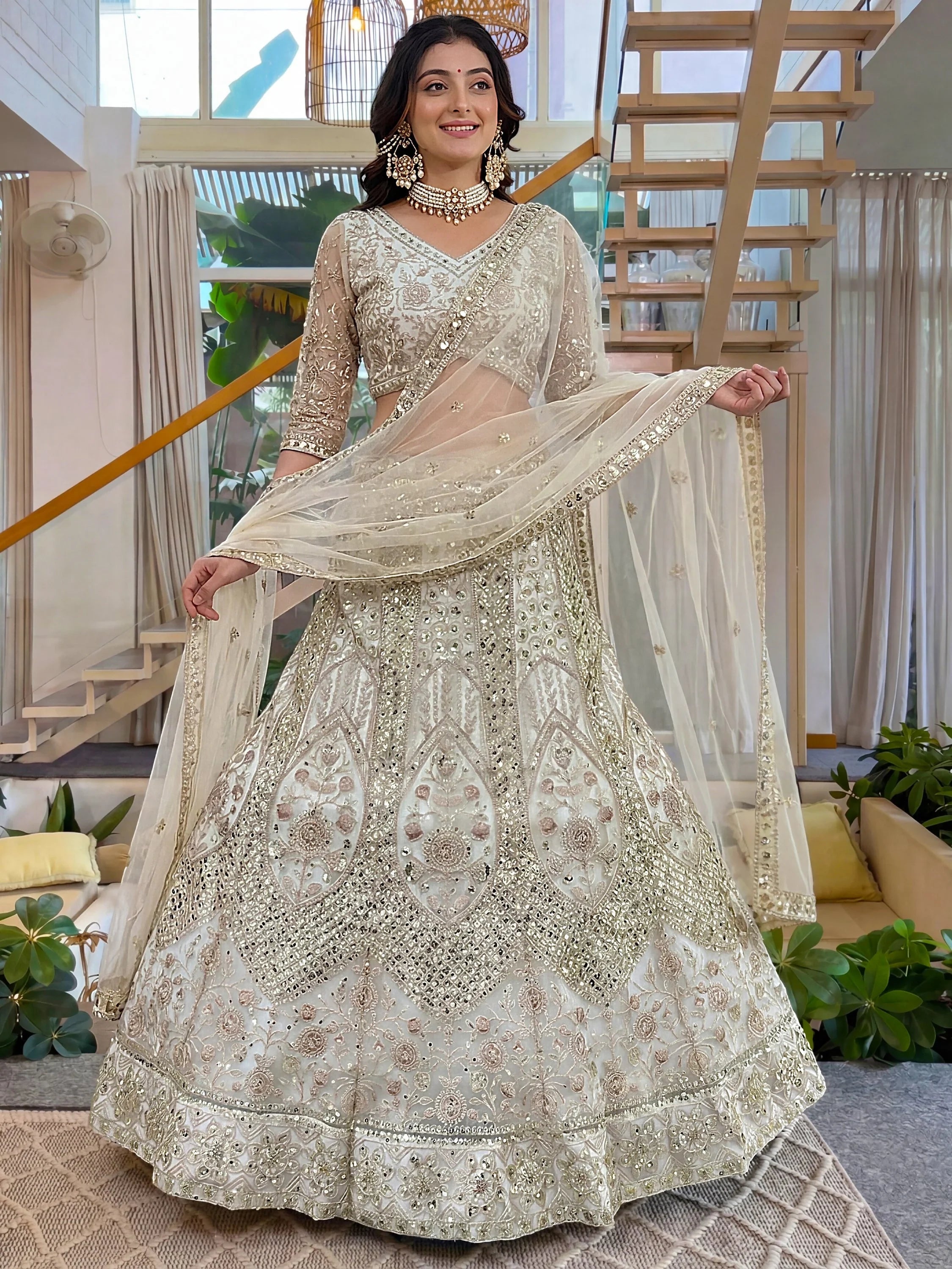 White Notable Sea Sequins Net Reception Wear Lehenga Choli