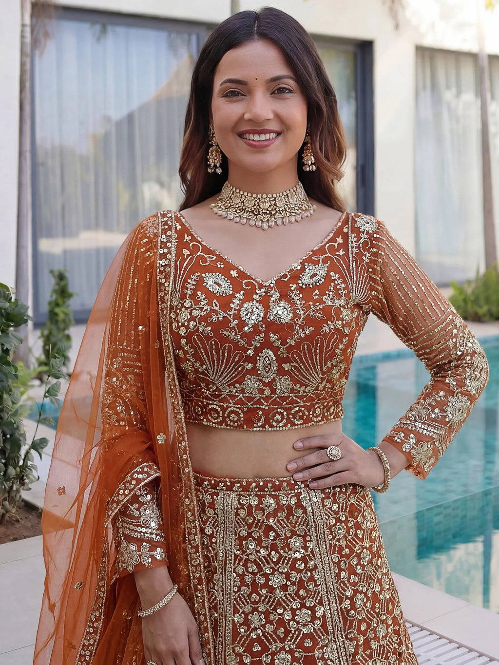 Orange Gorgeous Sequins Net Evening Wear Lehenga Choli With Dupatta
