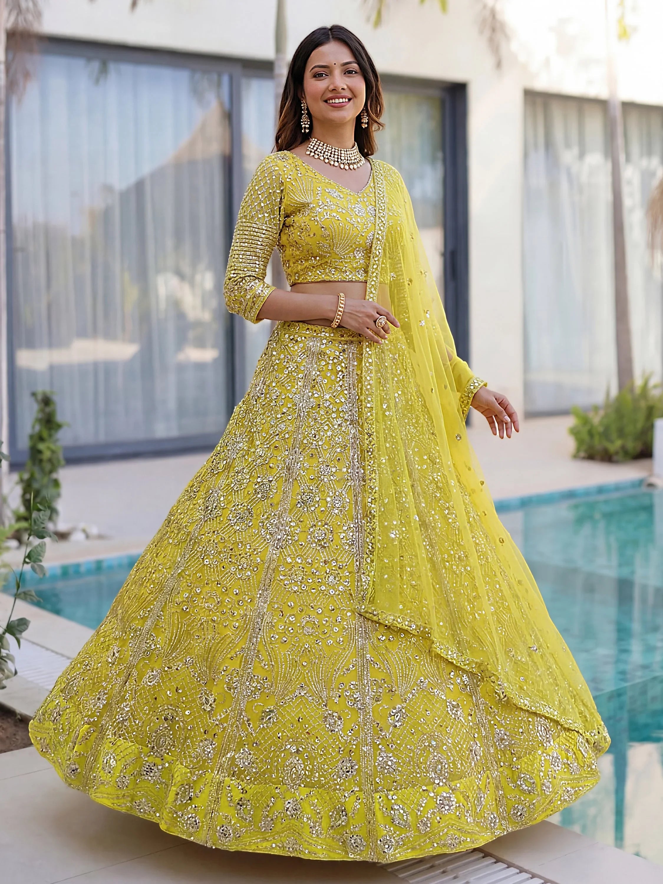 Yellow Gorgeous Sequins Net Evening Wear Lehenga Choli With Dupatta