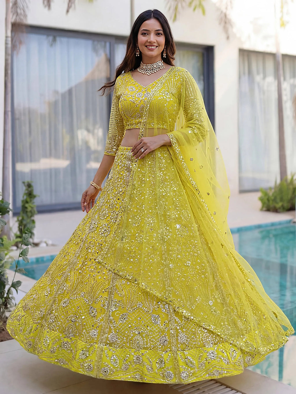 Yellow Gorgeous Sequins Net Evening Wear Lehenga Choli With Dupatta