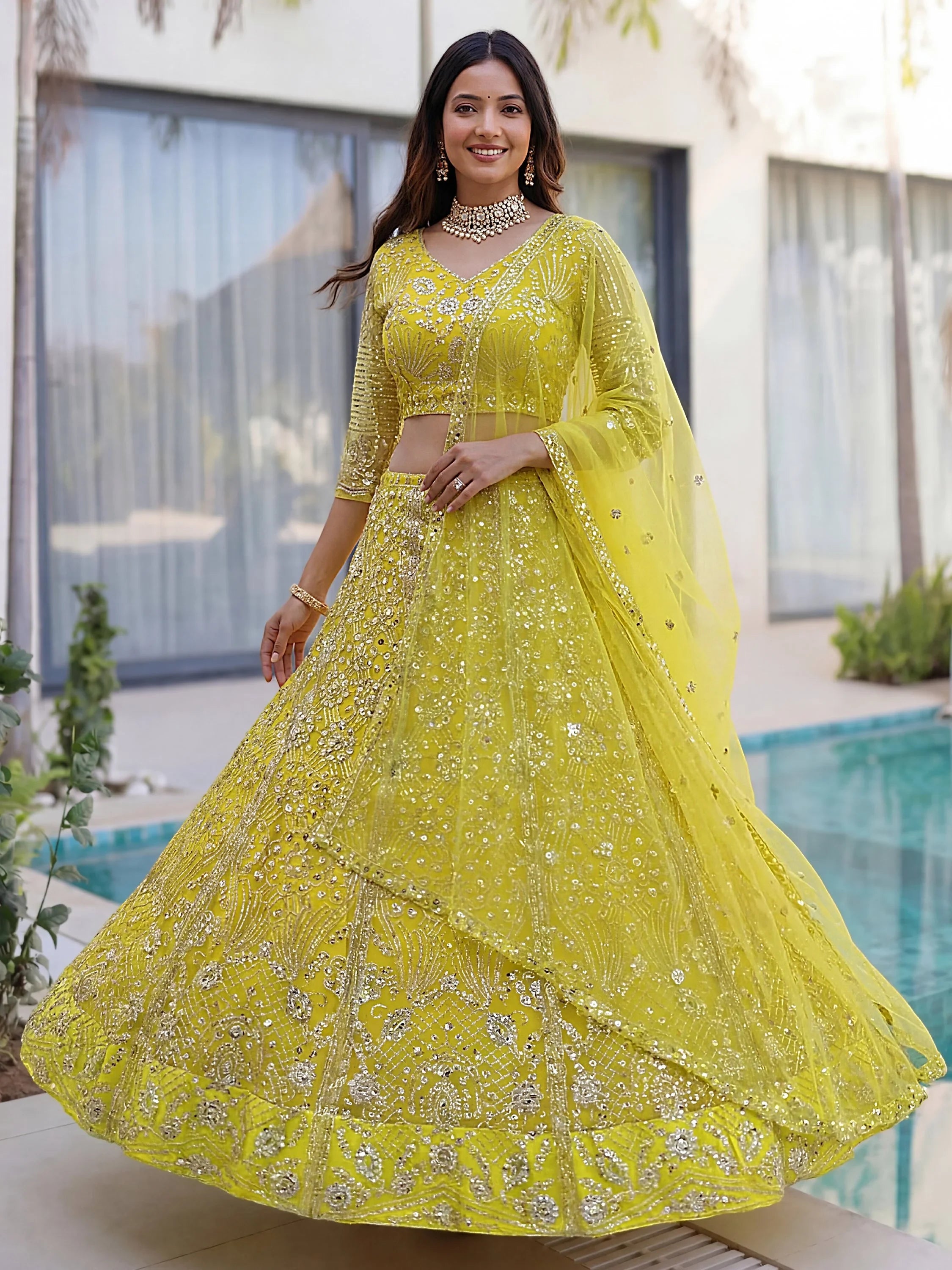 Yellow Gorgeous Sequins Net Evening Wear Lehenga Choli With Dupatta
