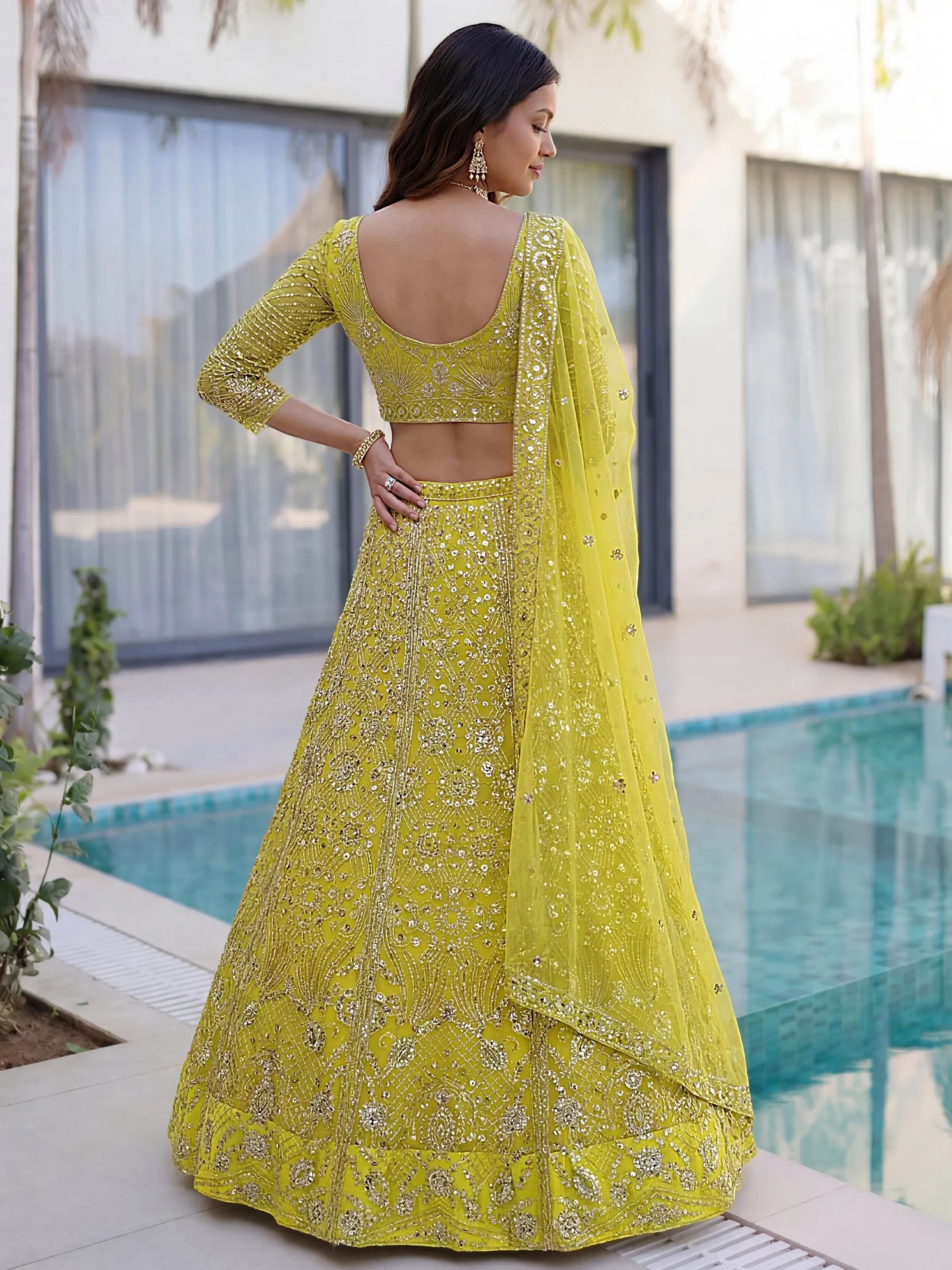 Yellow Gorgeous Sequins Net Evening Wear Lehenga Choli With Dupatta