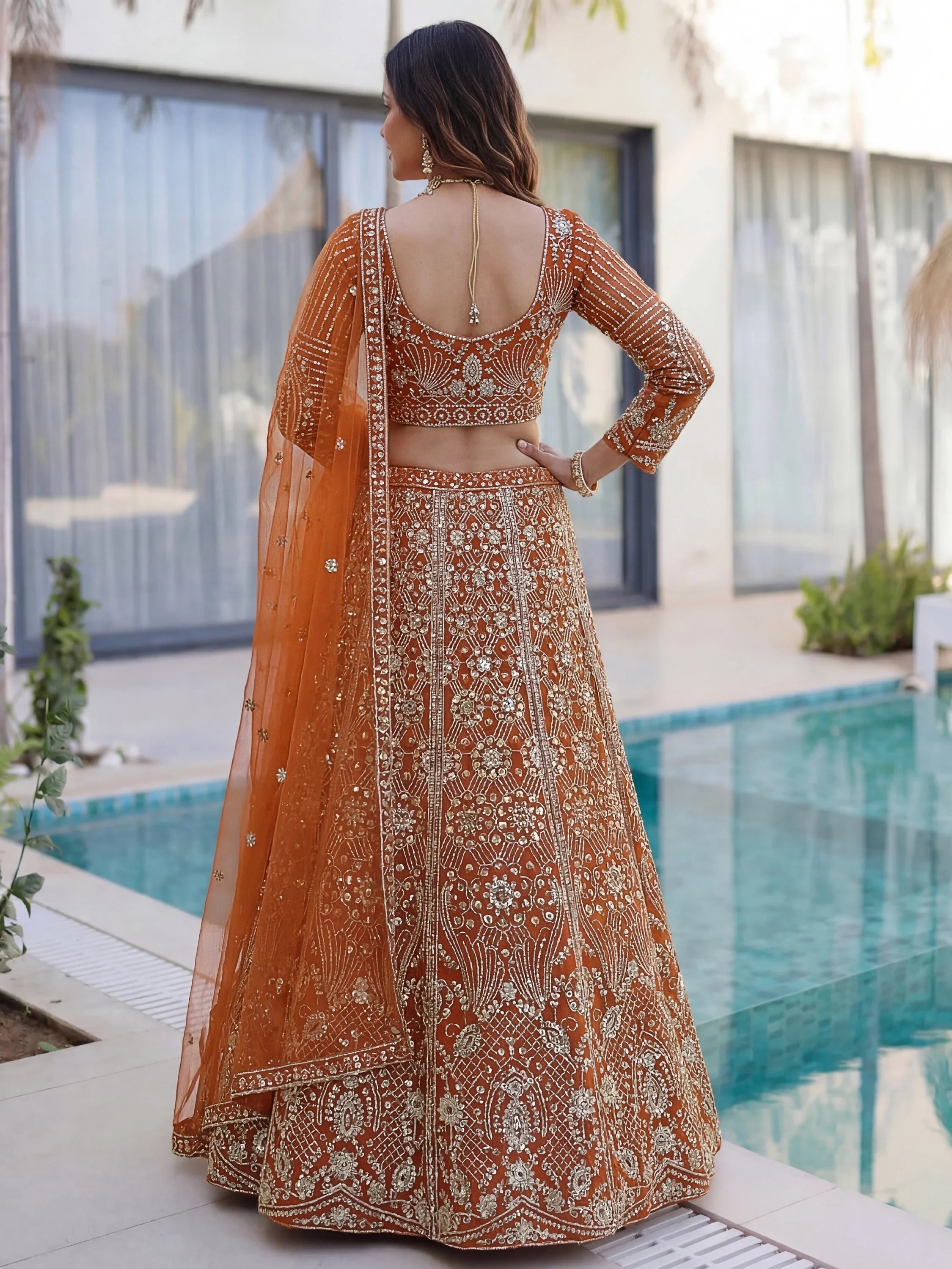 Orange Gorgeous Sequins Net Evening Wear Lehenga Choli With Dupatta
