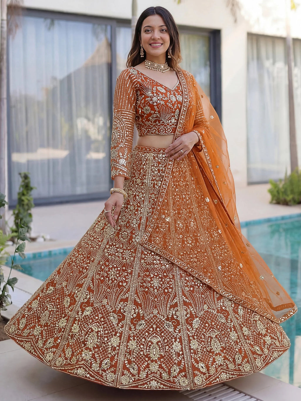 Orange Gorgeous Sequins Net Evening Wear Lehenga Choli With Dupatta