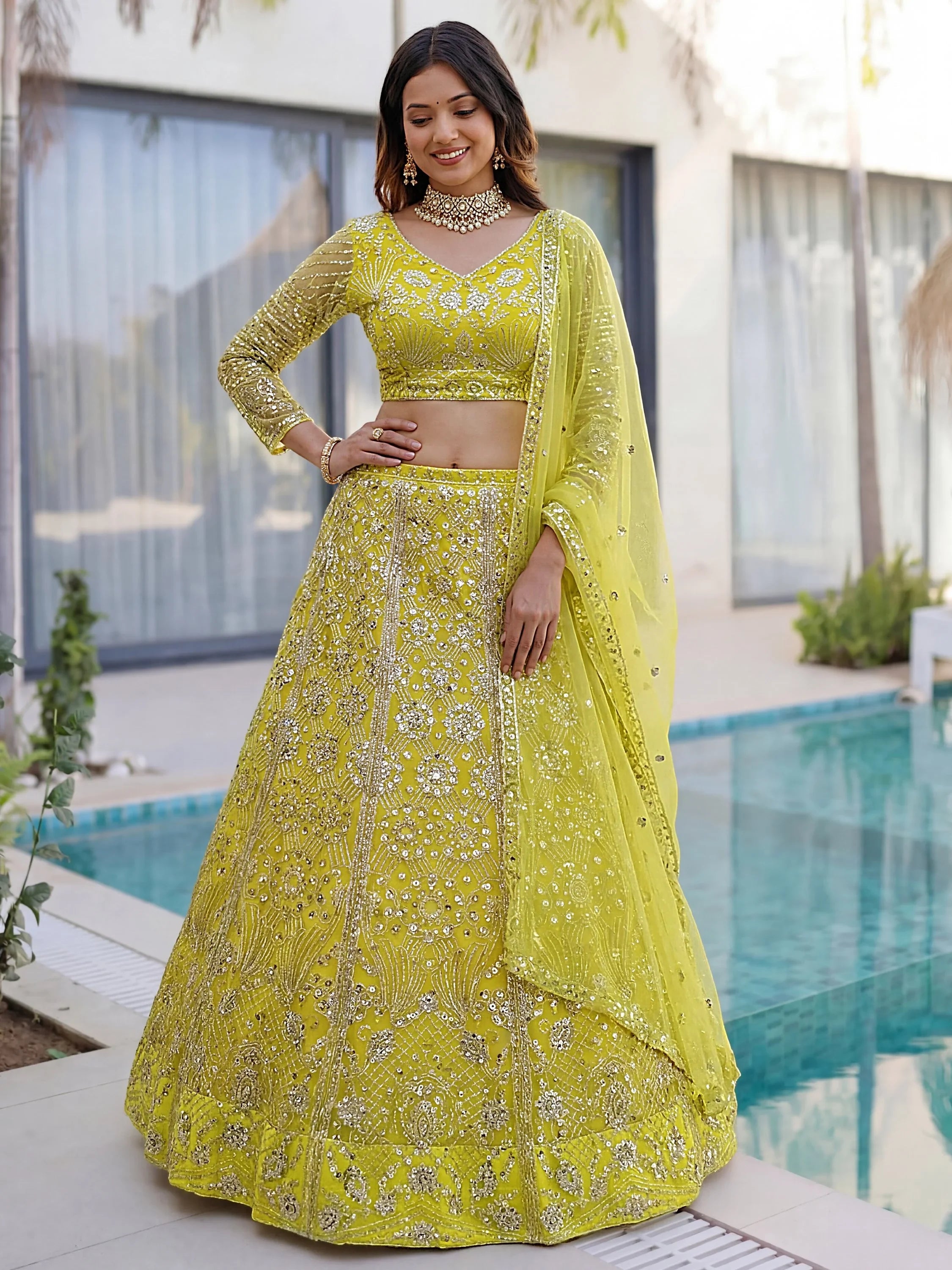 Yellow Gorgeous Sequins Net Evening Wear Lehenga Choli With Dupatta
