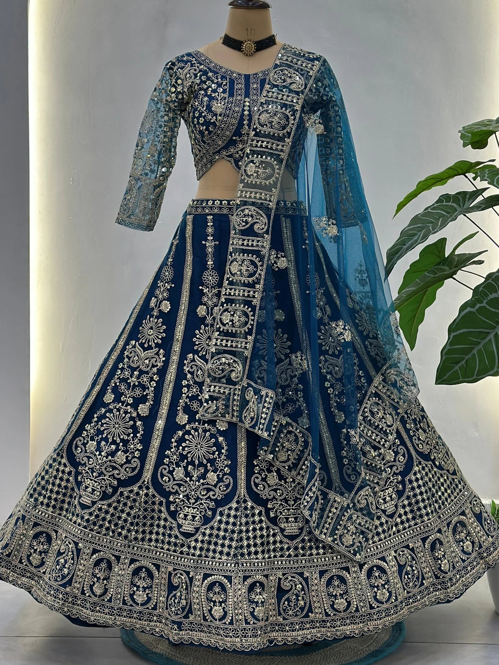 Teal Fabulous Embroidered Net Reception Wear Lehenga Choli