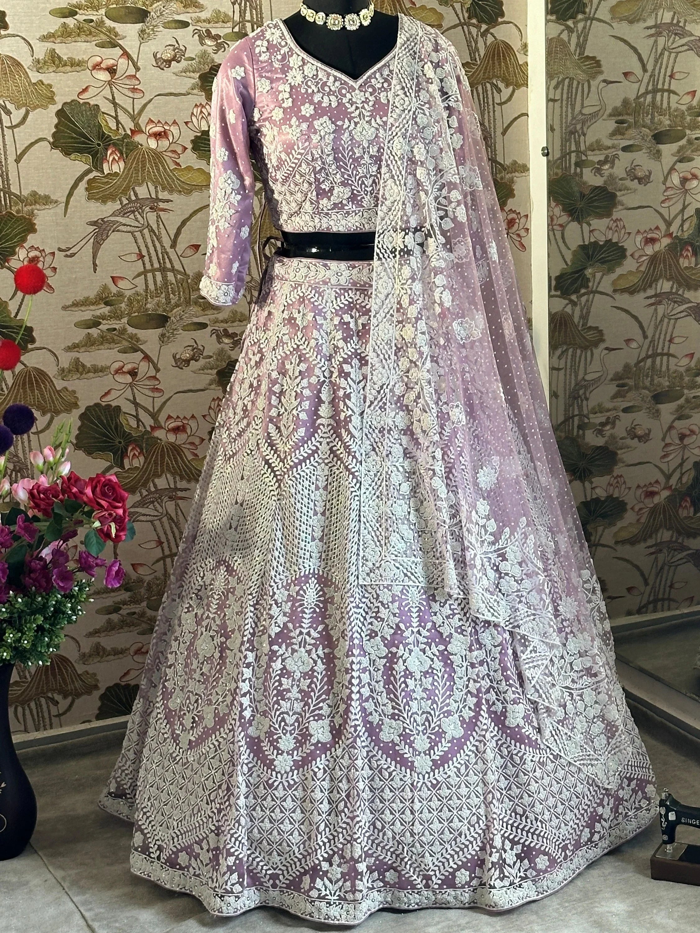 Astonishing Lilac Pearl Work Net Reception Wear Lehenga Choli