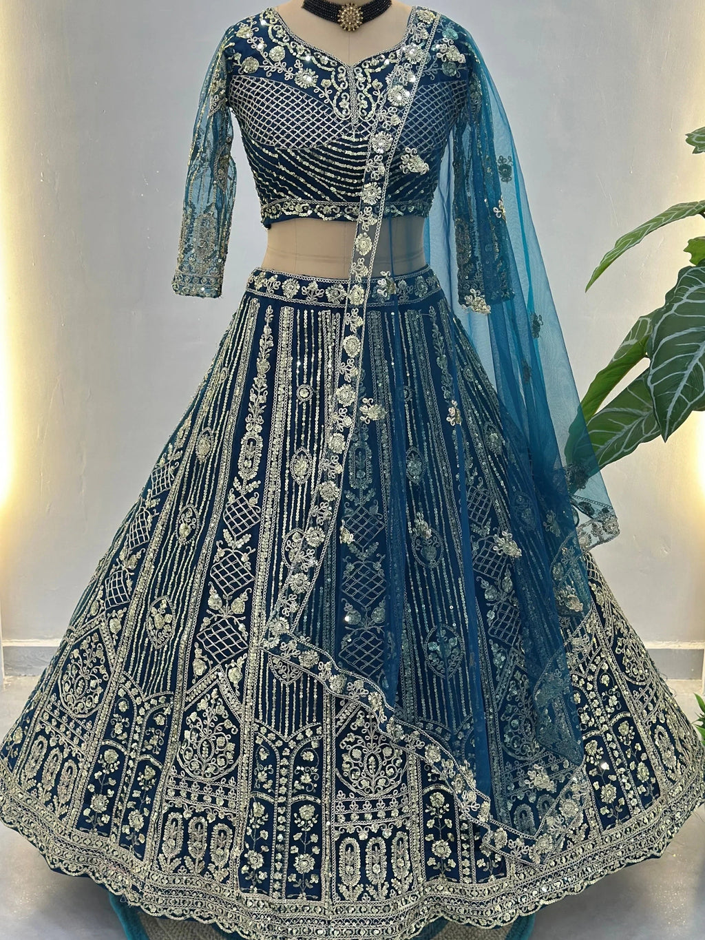 Blue Amazing Sequins Embroidered Net Party Wear Lehenga Choli