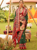 Spectacular Green Patola Printed Silk Wedding Wear Saree With Blouse